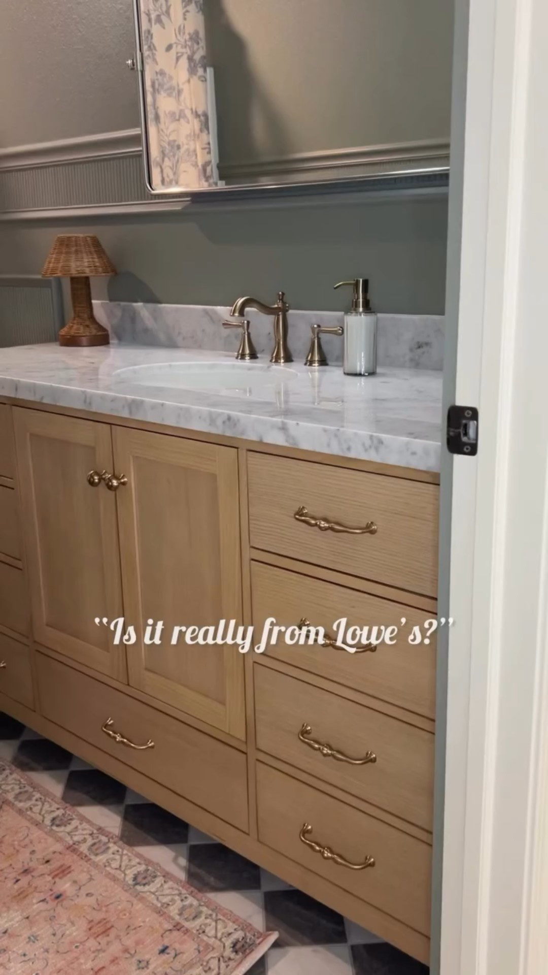 I’ve gotten this question quite a bit lately. The amount of people that can’t believe it came from a store and that we didn’t build it. 🤯

It took me a long while to find a 60” single sink vanity that I liked, let alone that I was willing to order and take a chance on 🙃

This oak vanity is SO GOOD! The photos on the website don’t do it justice. And a simple swap of the hardware gave it a totally different look, and we couldn’t be more pleased with it!

If you want to take a peak at it, comment Vanity and I’ll send over the link! 

#bathroomvanity #buildergradeupgrade #oakvanity #bathroomupdate #lowesfinds