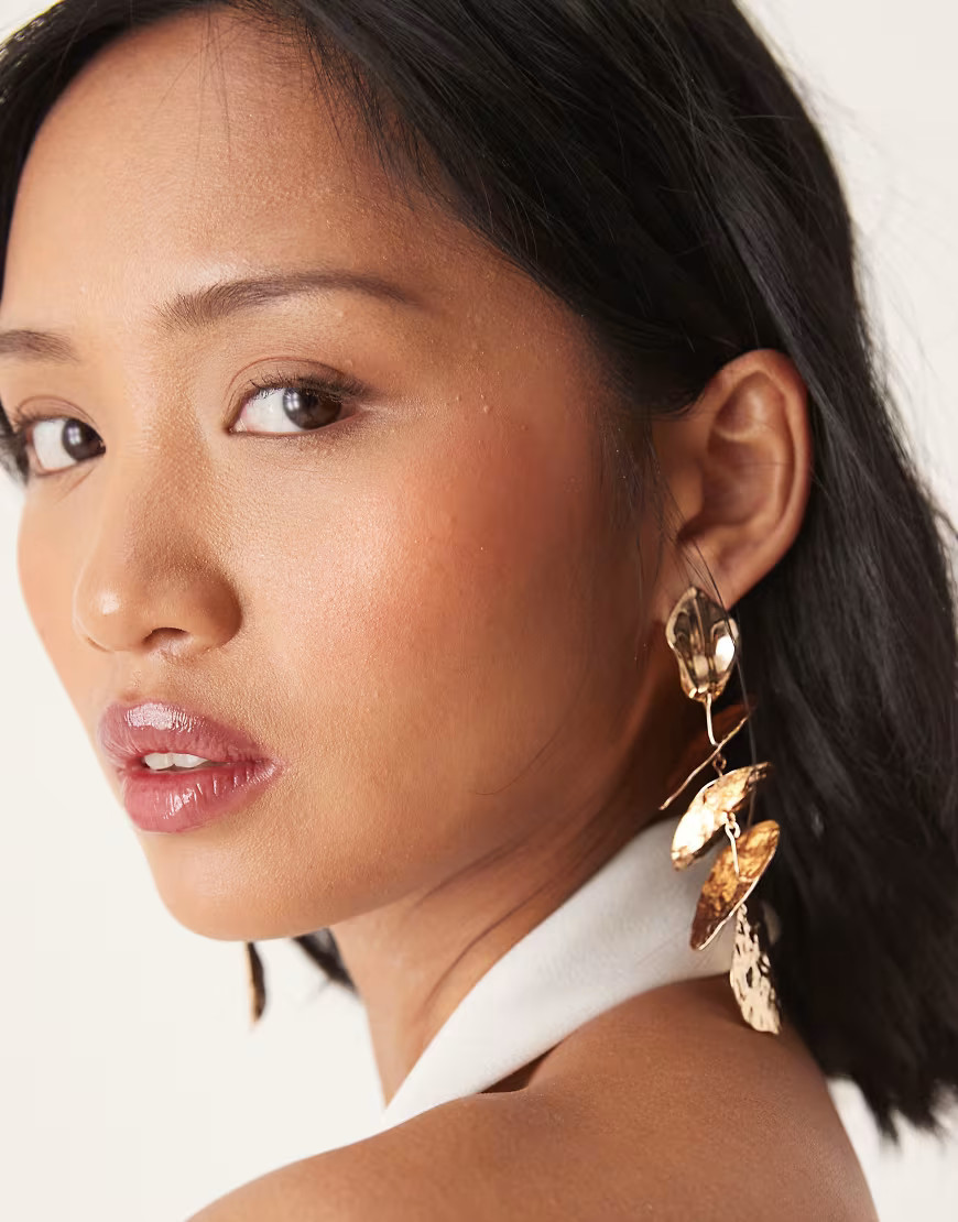 ASOS DESIGN drop earrings in hammered layered petal design in gold tone | ASOS (Global)
