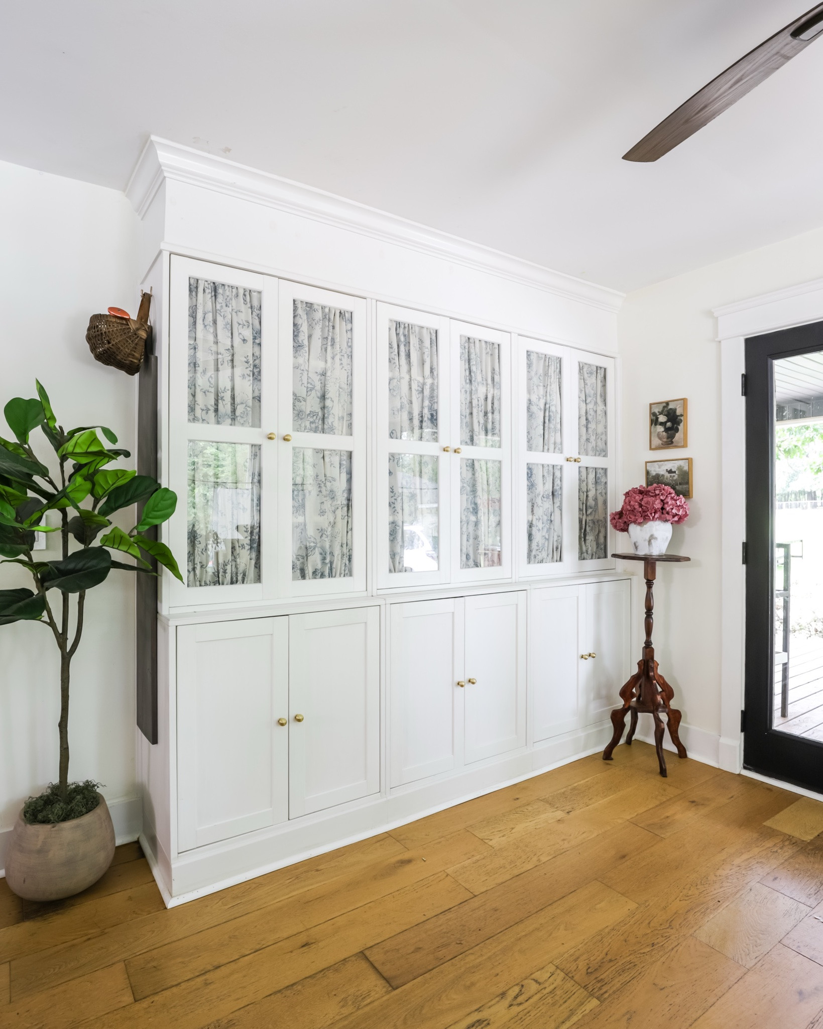 Home takes time ☺️ this IKEA cabinet has been years in the making. We went from blank slate -> IKEA cabinet -> custom looking built-in -> adding wallpaper to the back -> new hardware -> & now curtains!

We needed to create more pantry space & this was a super simple update to make that possible! 

Swipe to see all the phases of this cabinet!

✨You can checkout the complete tutorials for this IKEA cabinet on SouthernYankeeDIY.com