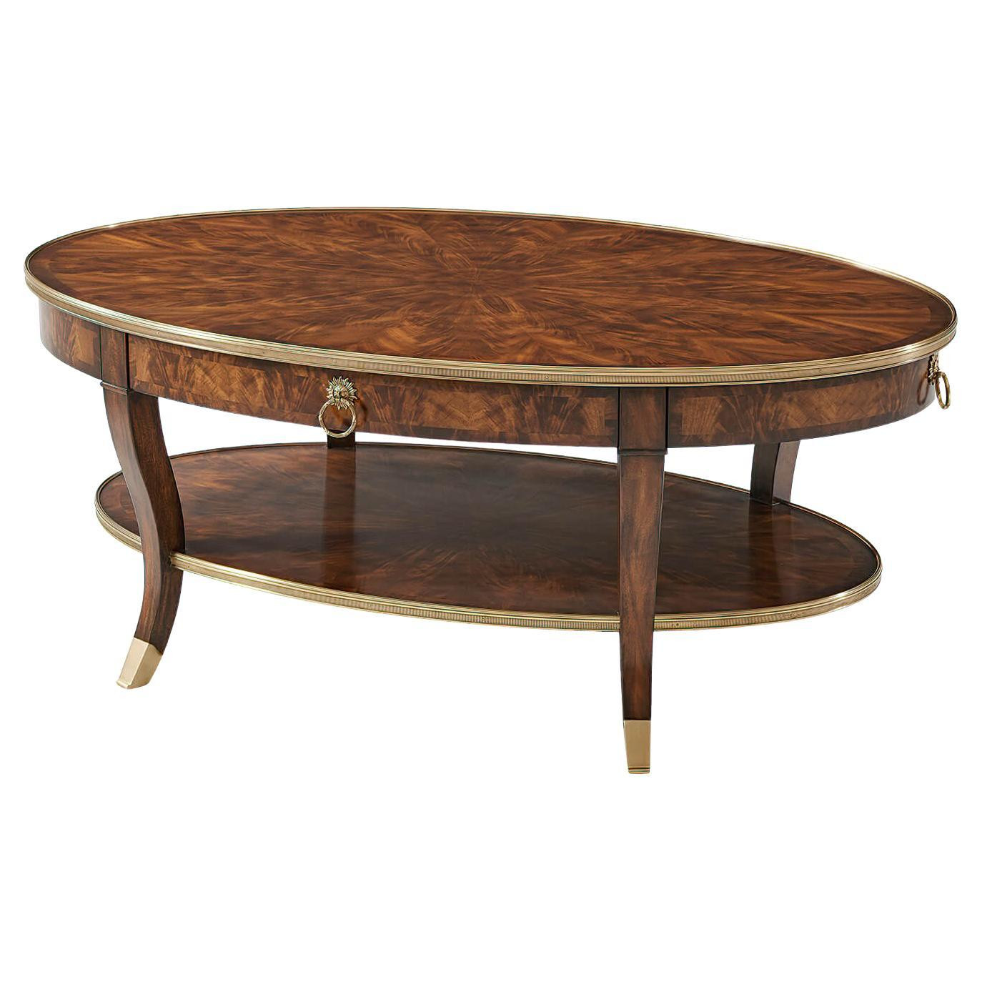 French Mahogany Oval Cocktail Table | 1stDibs