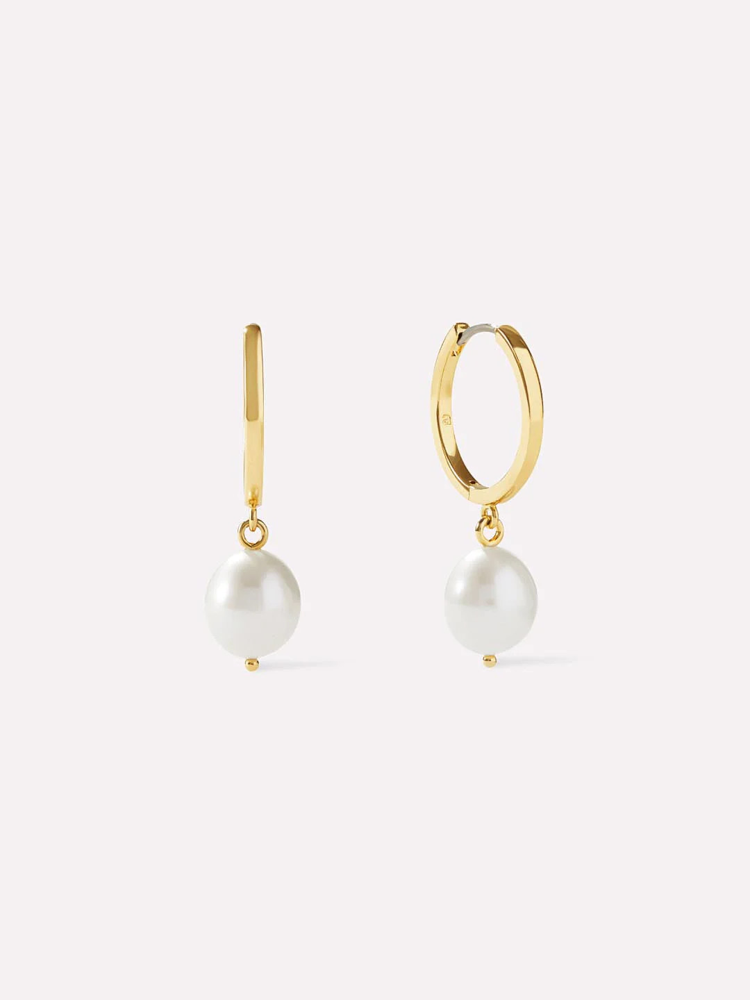 Meet our pearl hoops — a bigger, bolder version of our best-selling Frida earrings. Enhance you... | Ana Luisa