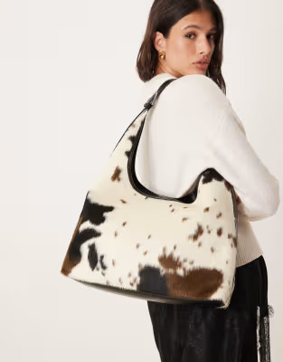 Gina Tricot large shoulder tote bag in cow print | ASOS (Global)