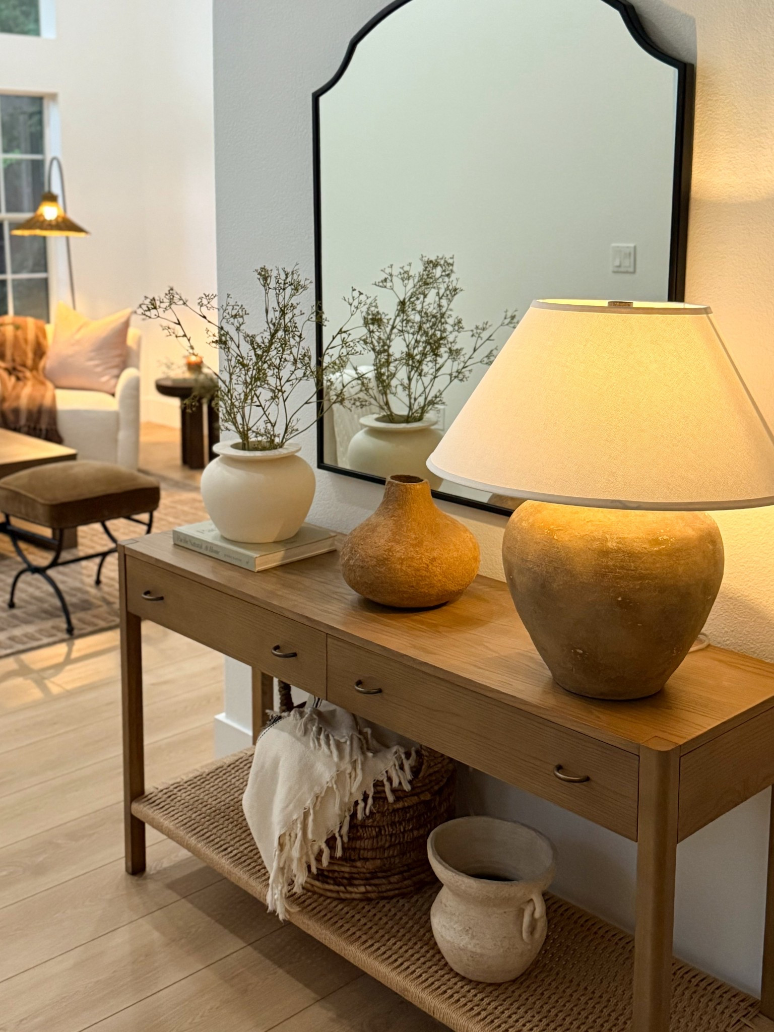 Entryway and console table styling!

In love with my new mirror! I finally bought it after adding it to my cart multiple times (IYKYK). 

Warm neutrals and wood tone, earthy and textured decor  

#LTKStyleTip #LTKHome #LTKU