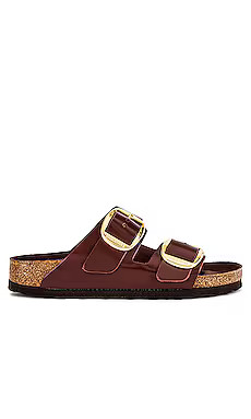 BIRKENSTOCK Arizona Big Buckle Sandal in High Shine Chocolate from Revolve.com | Revolve Clothing (Global)