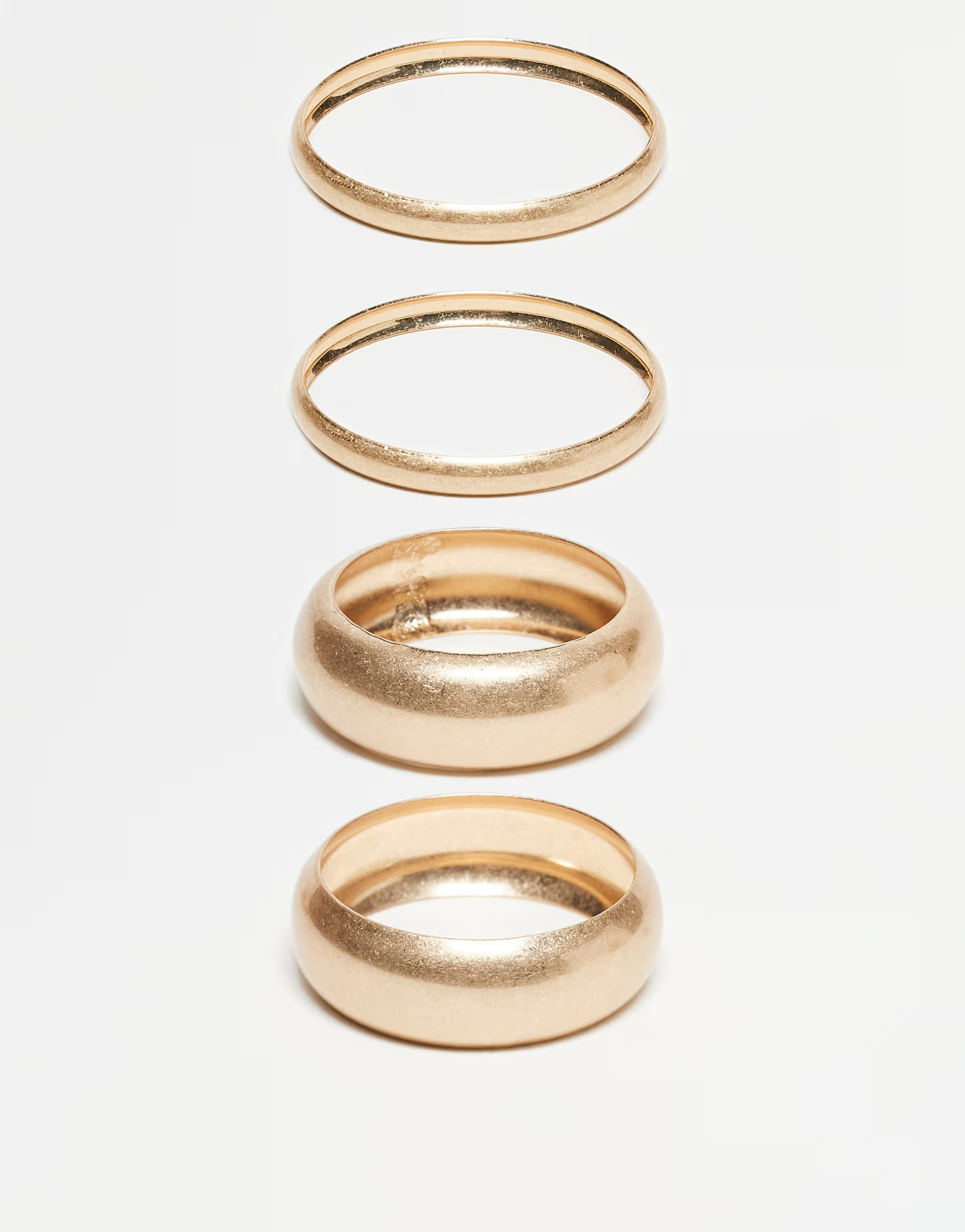 ASOS DESIGN pack of 4 bangles in brushed gold tone | ASOS (Global)