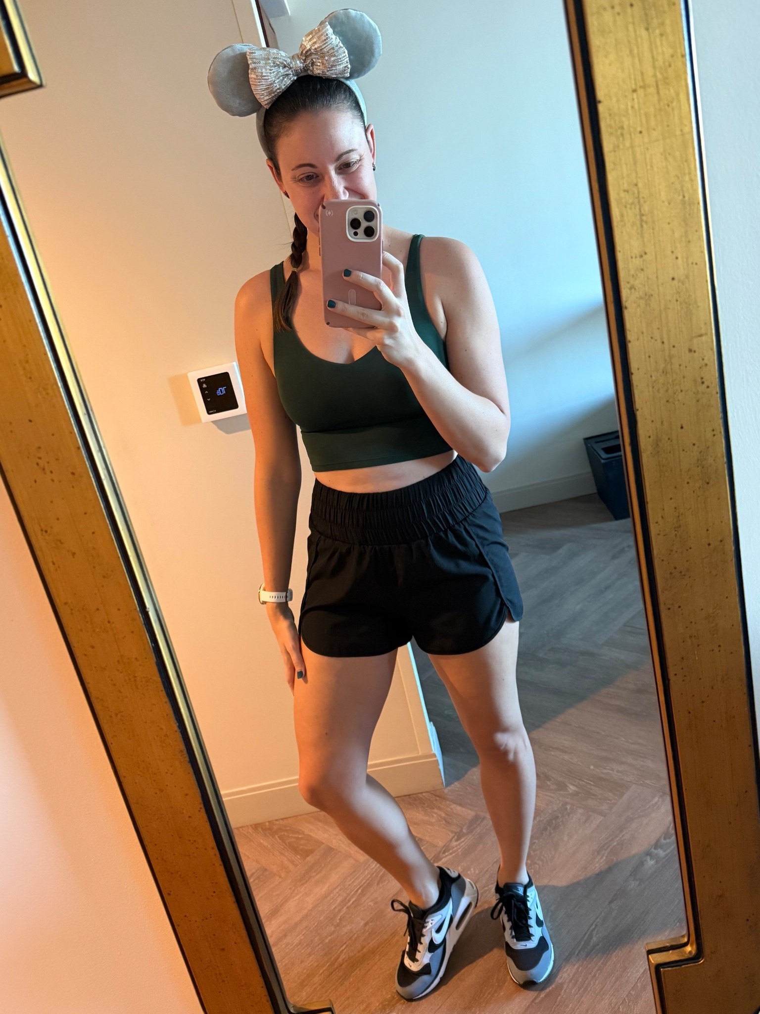 Disney park outfit! I love a built in bra top for the parks because I get hot and I need as few layers of fabric as possible! Paired with a pair of high waisted shorts, I don’t feel to revealed. Also love a cute pair of sneakers and my Minnie ears of course! 

#LTKgrwm #LTKootd #LTKTravel