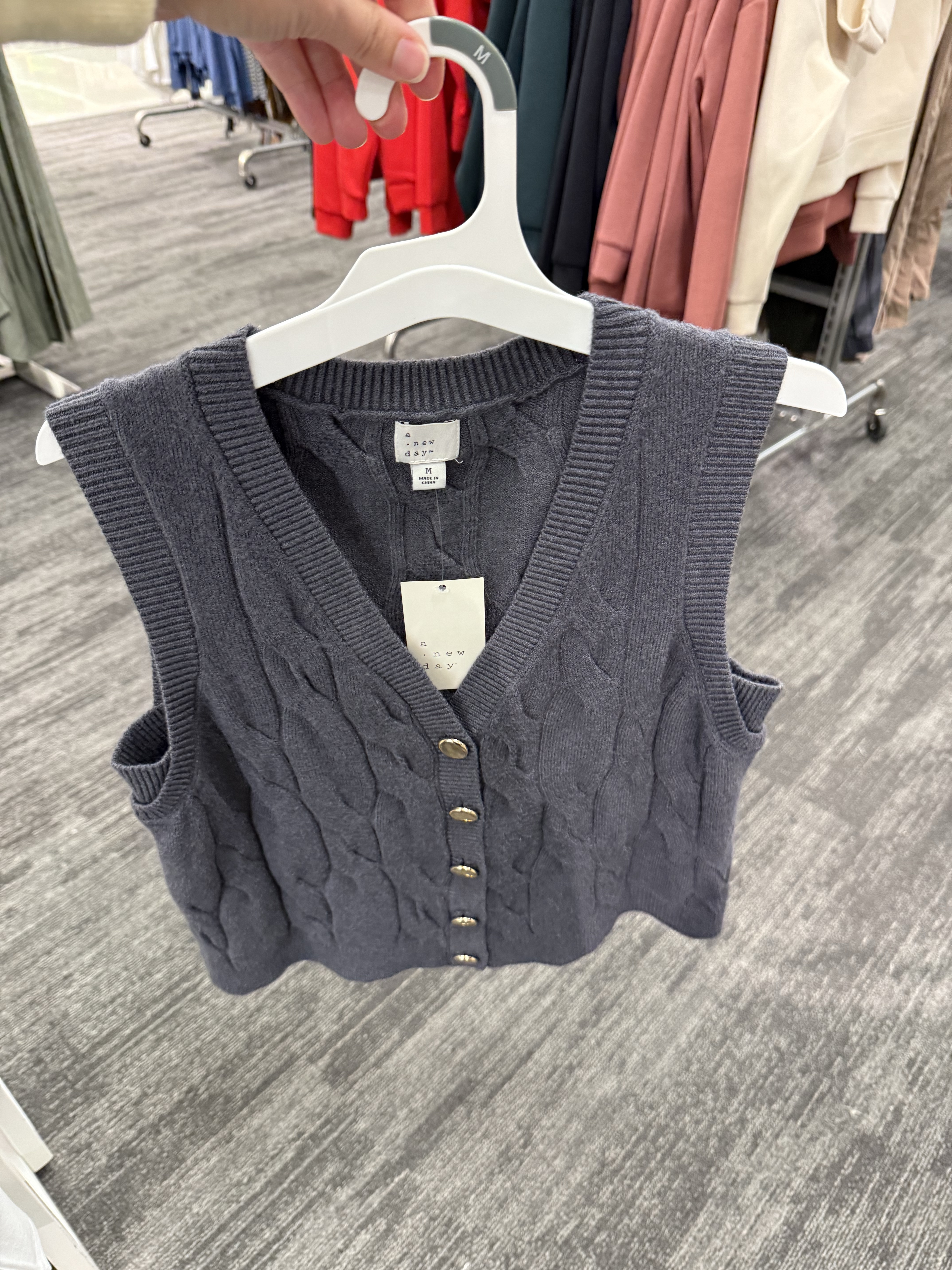 I love this gray cable knit sweater vest for fall! It would be perfect for family photos, and you could layer a long sleeve T-shirt underneath it or turtleneck later this winter and cooler months.

#LTKStyleTip #LTKSaleAlert #LTKFindsUnder50