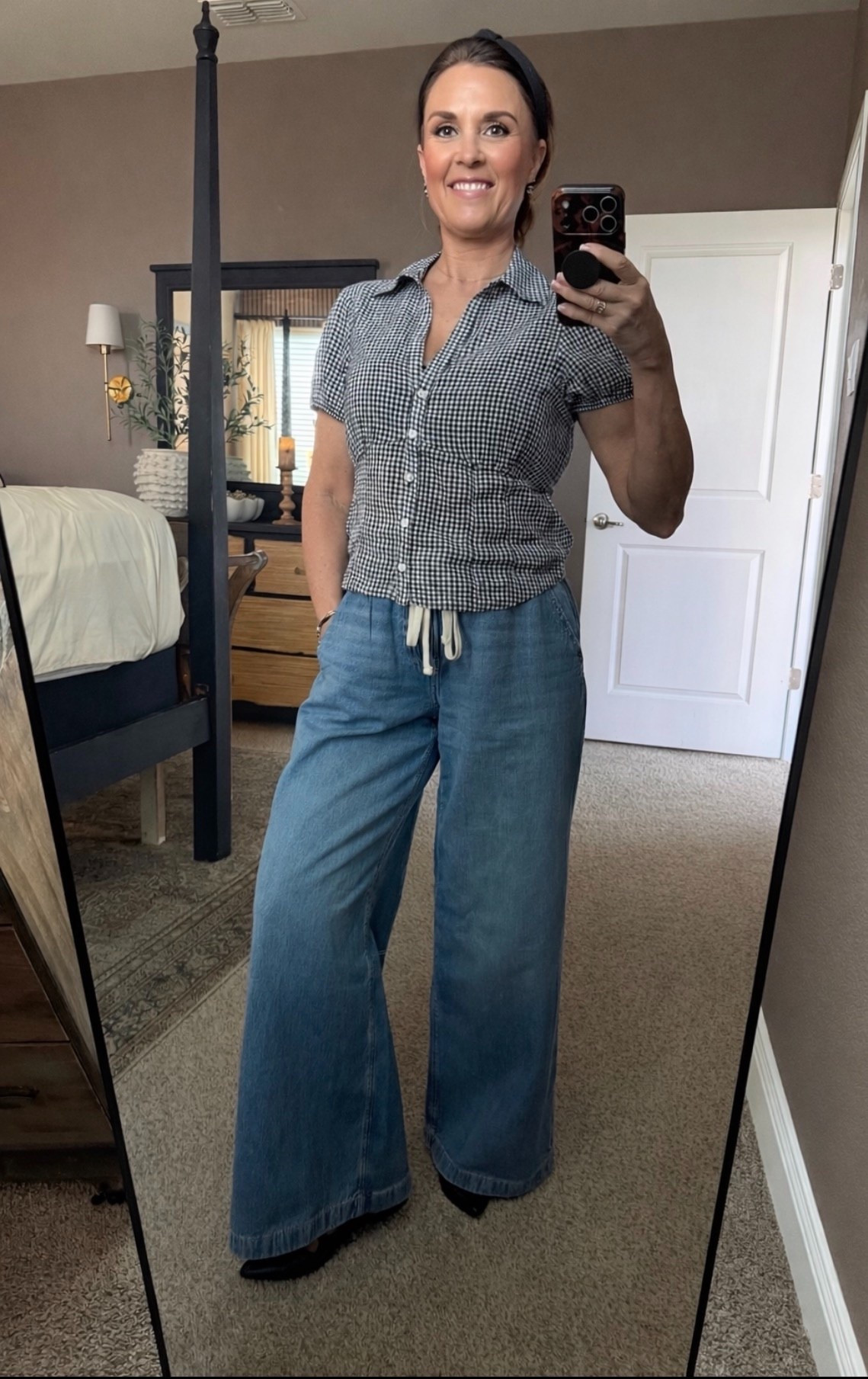 OOTD American Eagle Vibes- drawstring jeans, black and white top, summer top, black flats 

#LTKOver40 #LTKgrwm #LTKootd