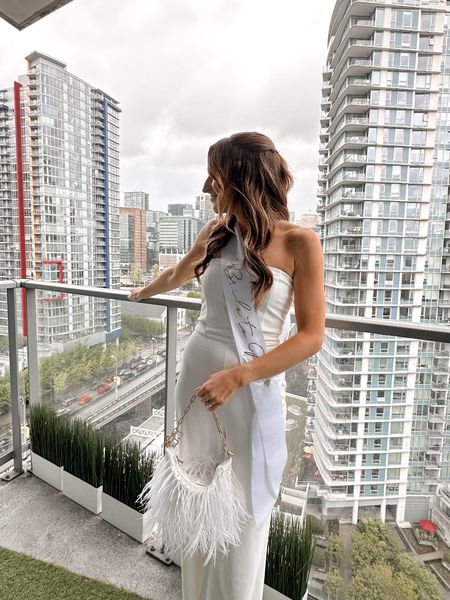 bachelorette party bridal outfit inspo // jumpsuit is lulus / sash is an etsy find / cult gaia feather bag was rented from borrow me bridal! 

#LTKstyletip #LTKparties #LTKwedding