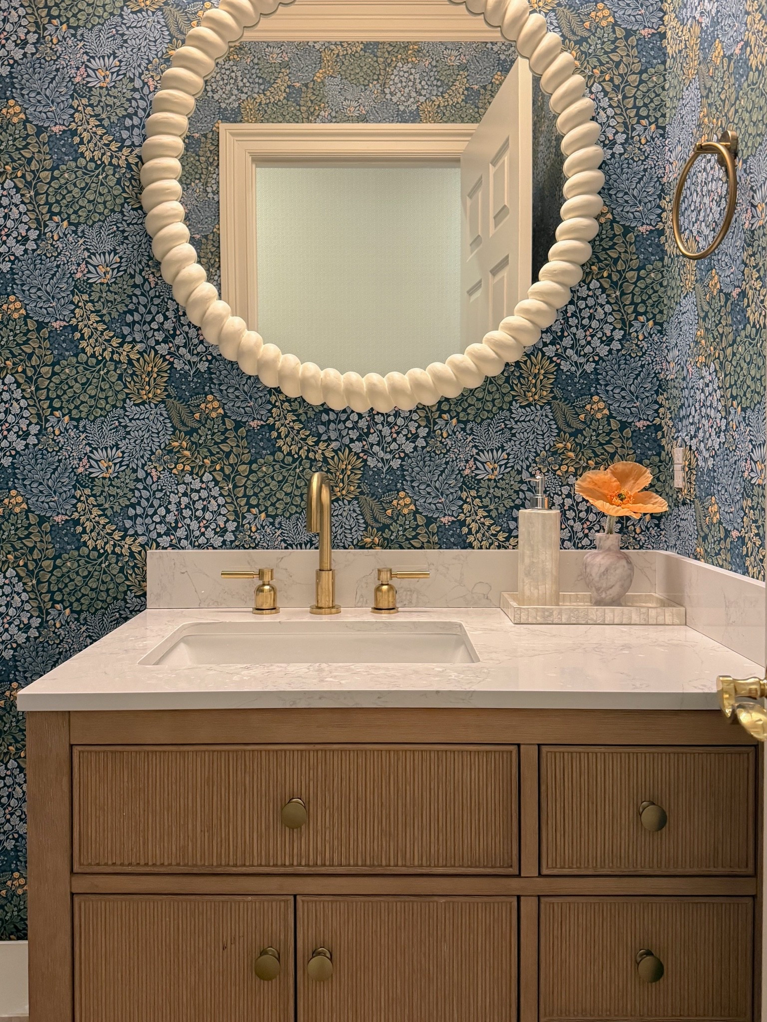 A small room is the perfect place to go bold and that’s exactly what we did with this powder room! The prettiest wallpaper, brass accents, statement lighting and the coolest mirror transformed an average bathroom into one of our favorite rooms in the home…

#LTKHome #LTKdayinmylife #LTKSaleAlert