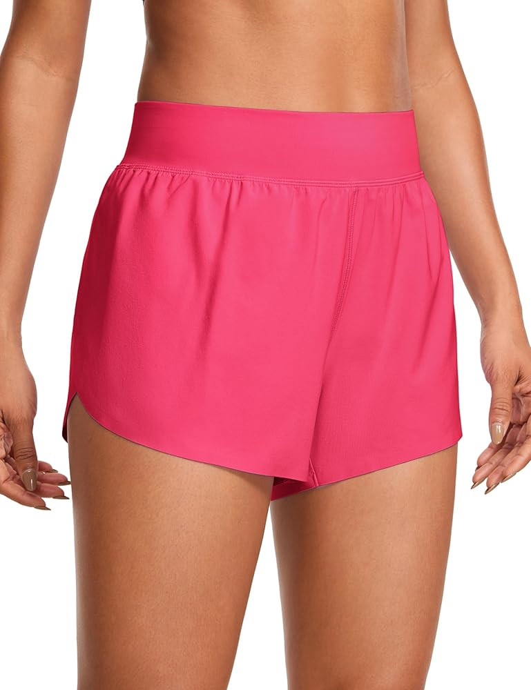 CRZ YOGA High Waisted Dolphin Athletic Running Shorts for Women High Split Comfy Mesh Liner Gym W... | Amazon (US)