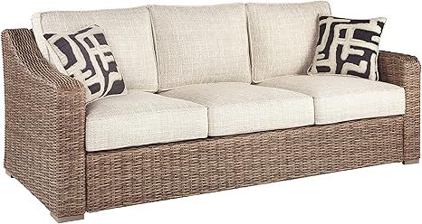 Signature Design by Ashley Beachcroft Outdoor Wicker Patio Sofa with Cushion and 2 Pillows, Beige... | Amazon (US)
