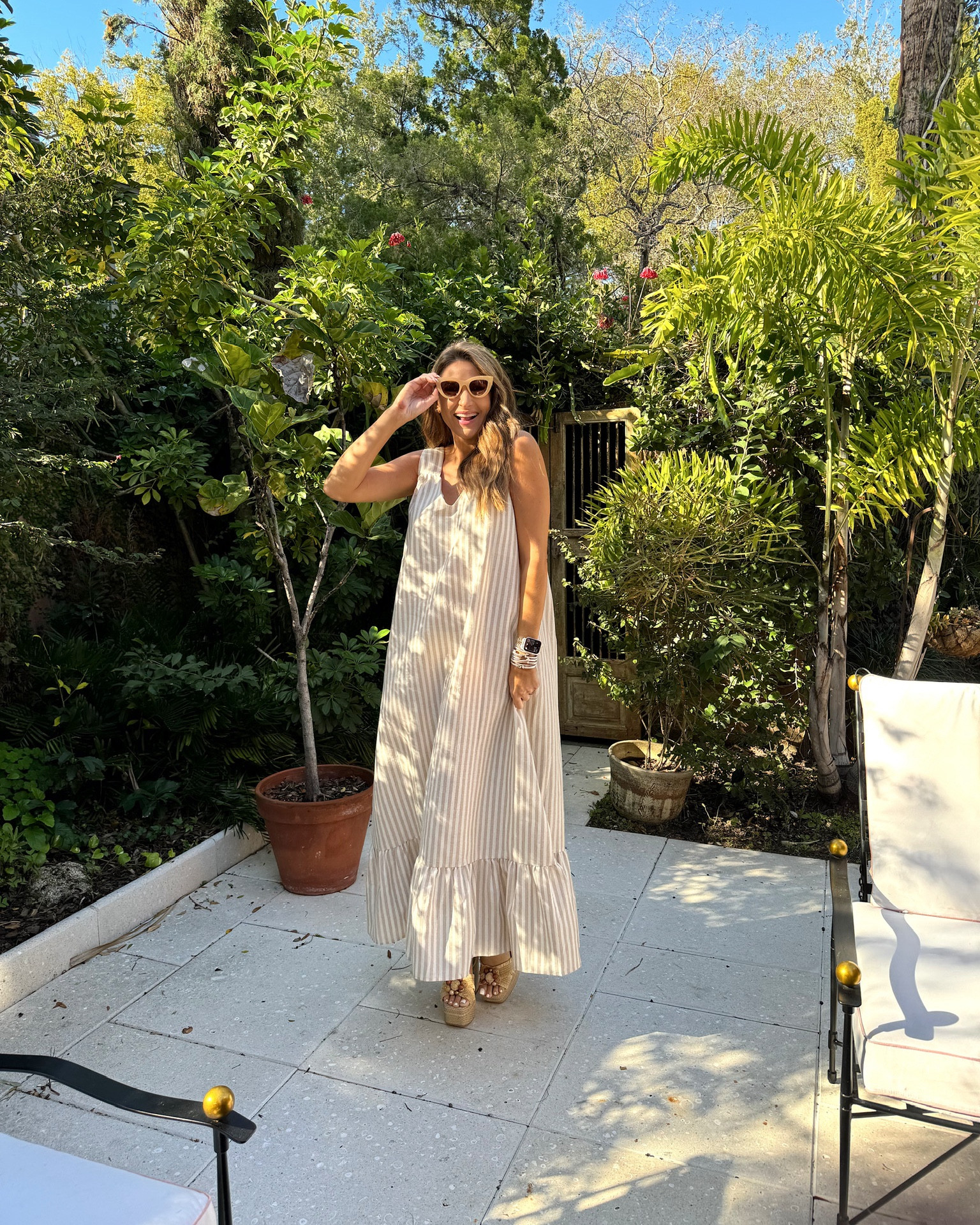 In a small loose stripe maxi dress, rattan platform sandals and accessories for spring - all fits TTS.

#LTKfindsunder50 #LTKSpringSale #LTKSeasonal