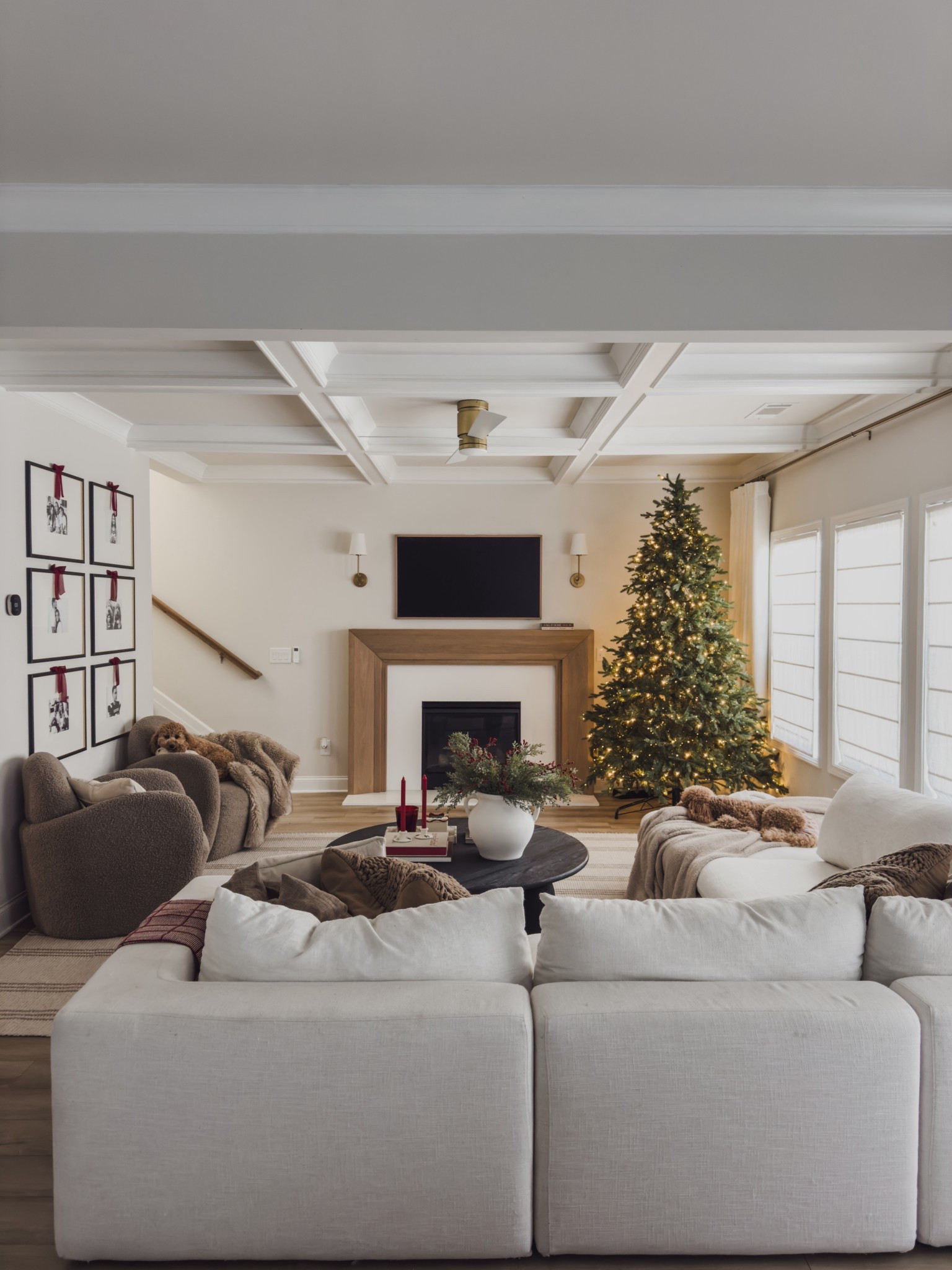 Slowly adding Christmas decor into our home. I like to add things slowly and not overwhelm myself. 

The tree is perfectly fluff which took so much time. I added the prettiest chiffon ribbon the the gallery wall.

Still working on coffee table styling.

Home inspo, Christmas style, holiday home decor, castlery sectional, wayfair fireplace, shop the look. 

#LTKHoliday #LTKHome #LTKSeasonal