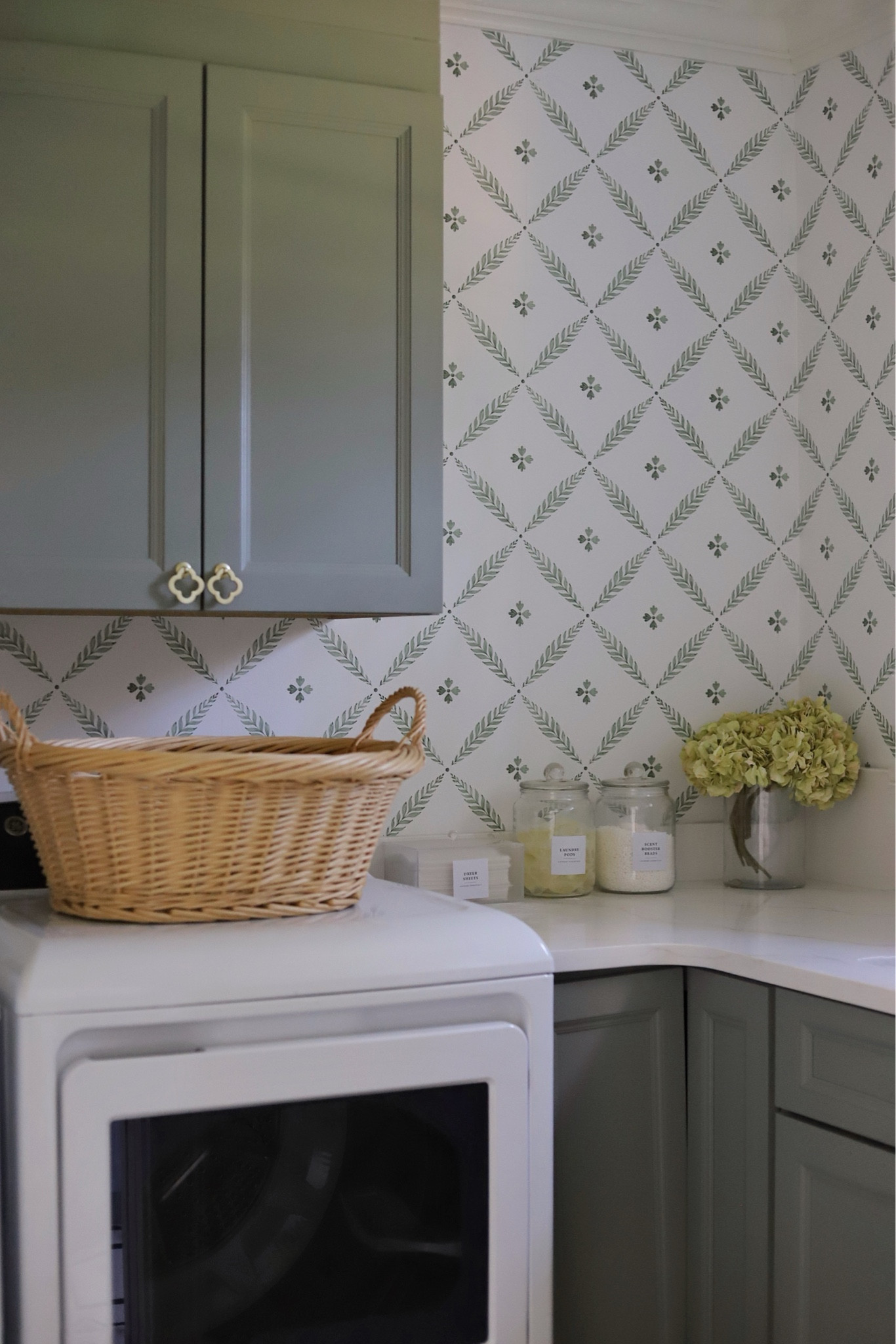Mud room and laundry room design details 🧺

Cabinets are a custom green from our cabinet maker. Mud room cabinetry is painted French Toile by BM  

#LTKFamily #LTKHome