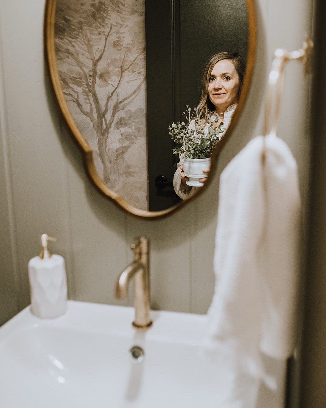 This bathroom was part of our Riverside renovation—our first full flip after I stepped away from running my design firm to focus on flipping homes full time.

I still love every detail: the curved mirror, the warm wood, the soft blush wallpaper, the deep green walls… it felt like a true return to me.

And while I don’t take on full design projects anymore, I do still offer one-on-one consults if you need help pulling your space together.
Everything I sourced for this room is linked here 💛

#bathroomdesign #riversidereno #interiordesigner #designconsultation #ltkhome #ltkinterior #drapersdoingrenos