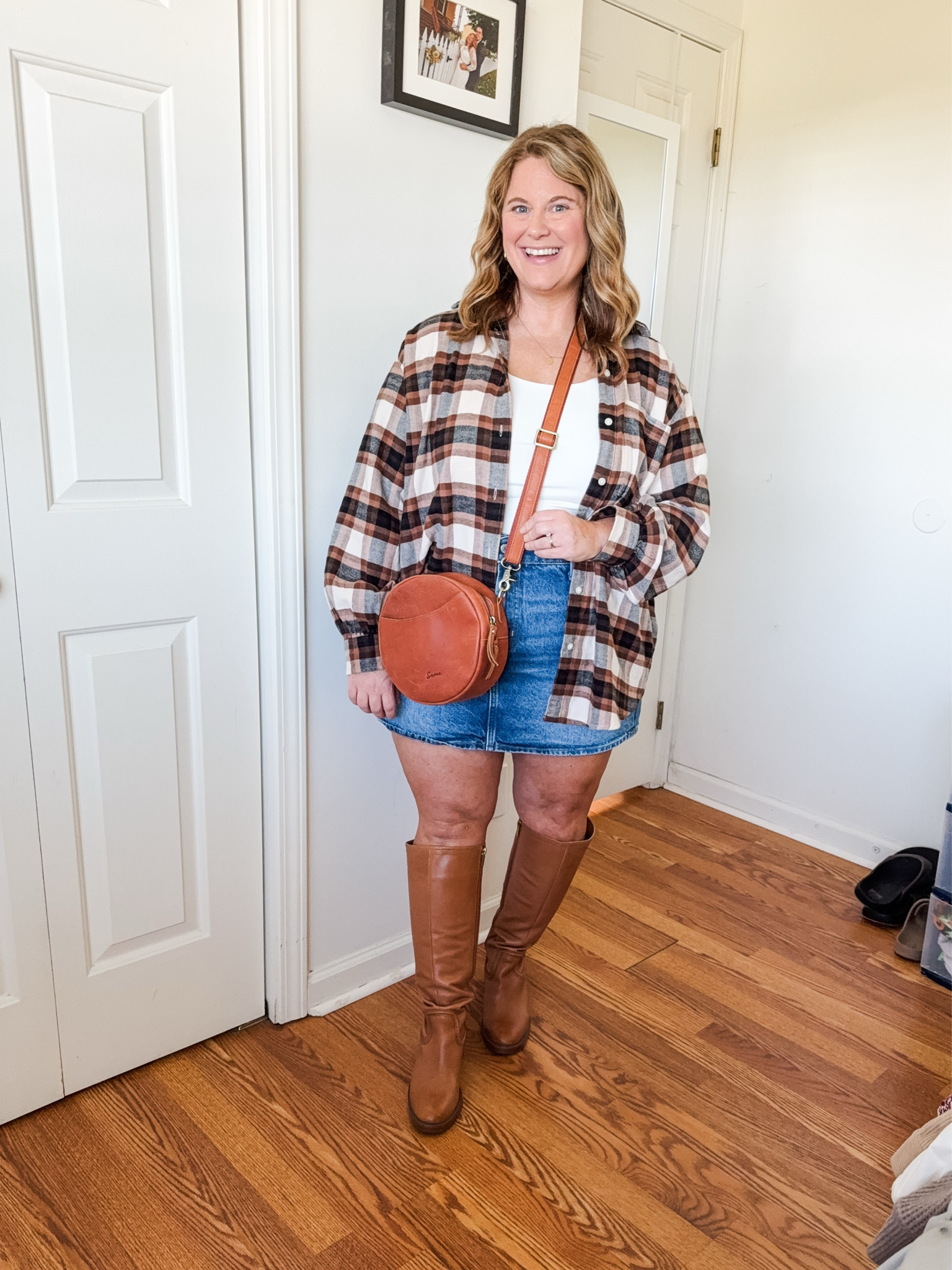 Wearing a medium in my flannel, XL in tank.  Skirt and boots are older so linked similar  

#LTKSeasonal #LTKFallSale #LTKMidsize