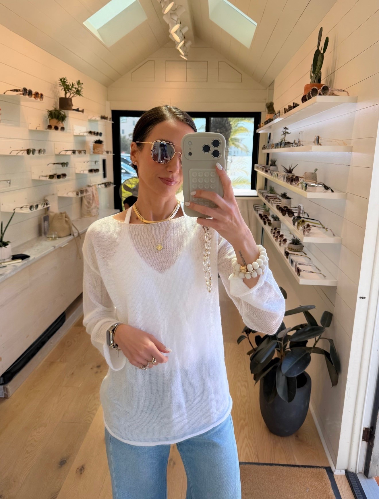 this is such an easy chic everyday look. a lightweight white knit, denim, and layered gold jewelry is always a yes, finished with the perfect pair of sunnies to pull it all together

everyday outfit, casual chic style, white top outfit, denim outfit inspo, neutral style, spring outfit, summer outfit, effortless style, gold jewelry, sunglasses style, annabrstyle 

#LTKSeasonal #LTKTravel #LTKootd