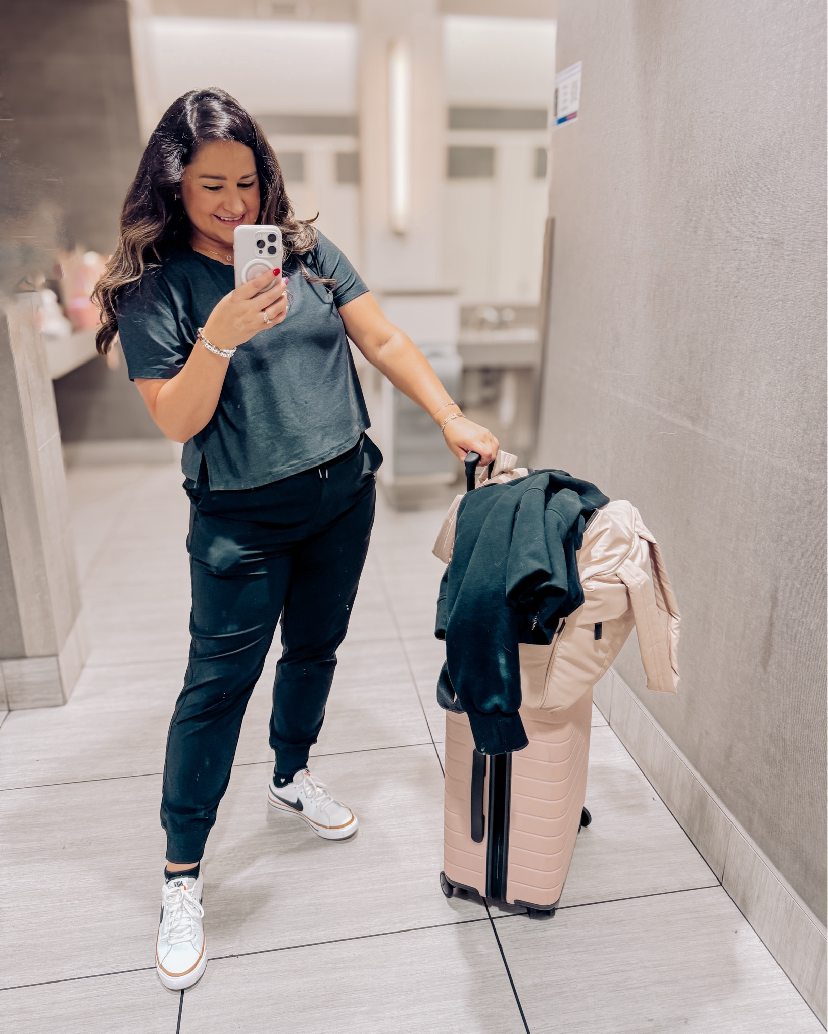 My travel outfit is comfortable and cute!

Love these new old navy joggers that remind me of lululemon. I’m wearing a size large petite 

My comfy tshirt is also old navy and I’m wearing a size large

My cute sneakers are actually cheaper to get in a kids size! I wear a women’s 8 and a kids 6.

Also my luggage is all considered carry on luggage! I swear by my away bag and my calpak duffel bag!

Travel style
White sneakers
Black joggers
Carryon luggage 
Hard shell suitcase
Away carryon
Roller luggage

#LTKMidsize #LTKTravel #LTKActive