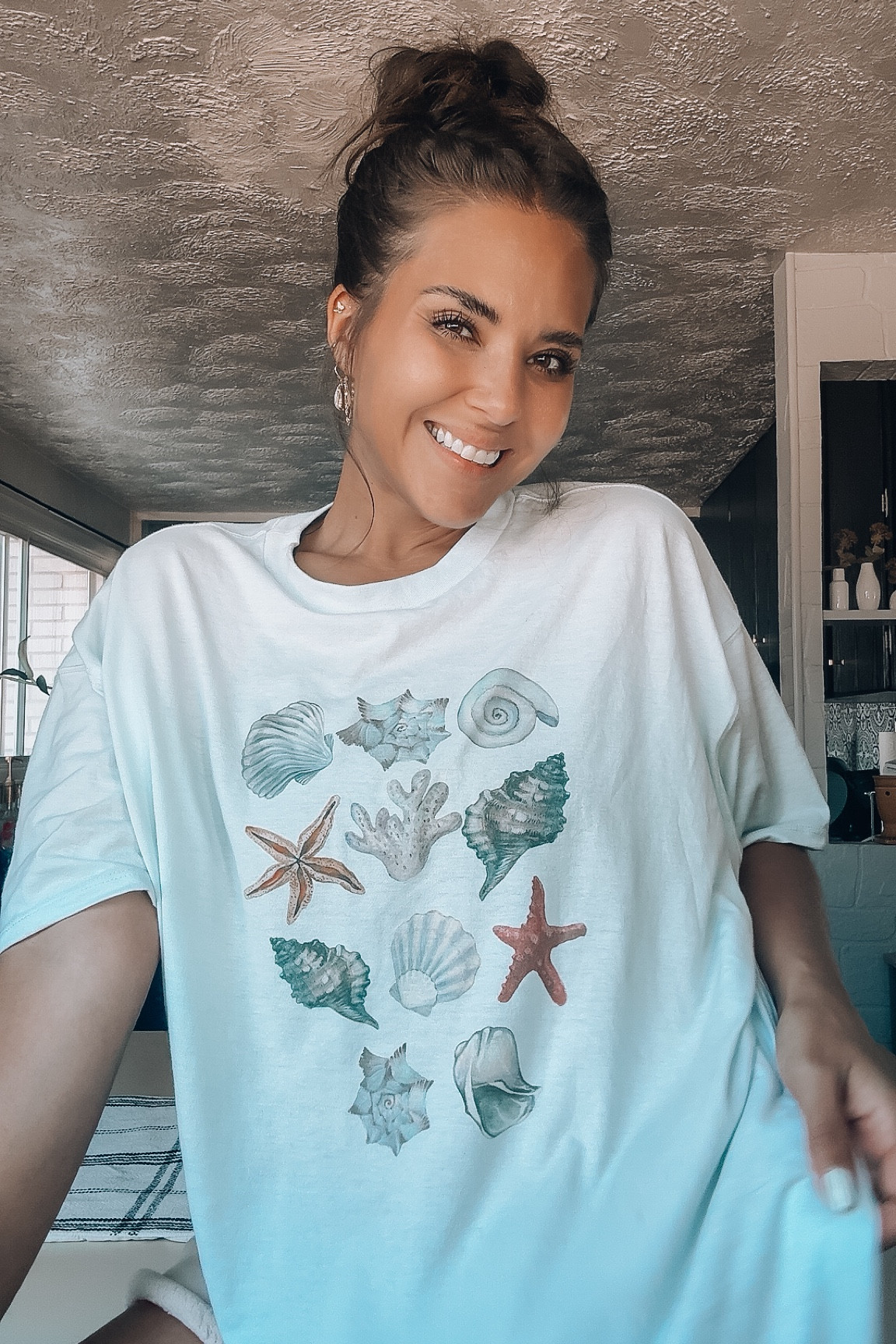 Seashell 🐚 tee 

#LTKStyleTip #LTKFindsUnder50 #LTKBeauty