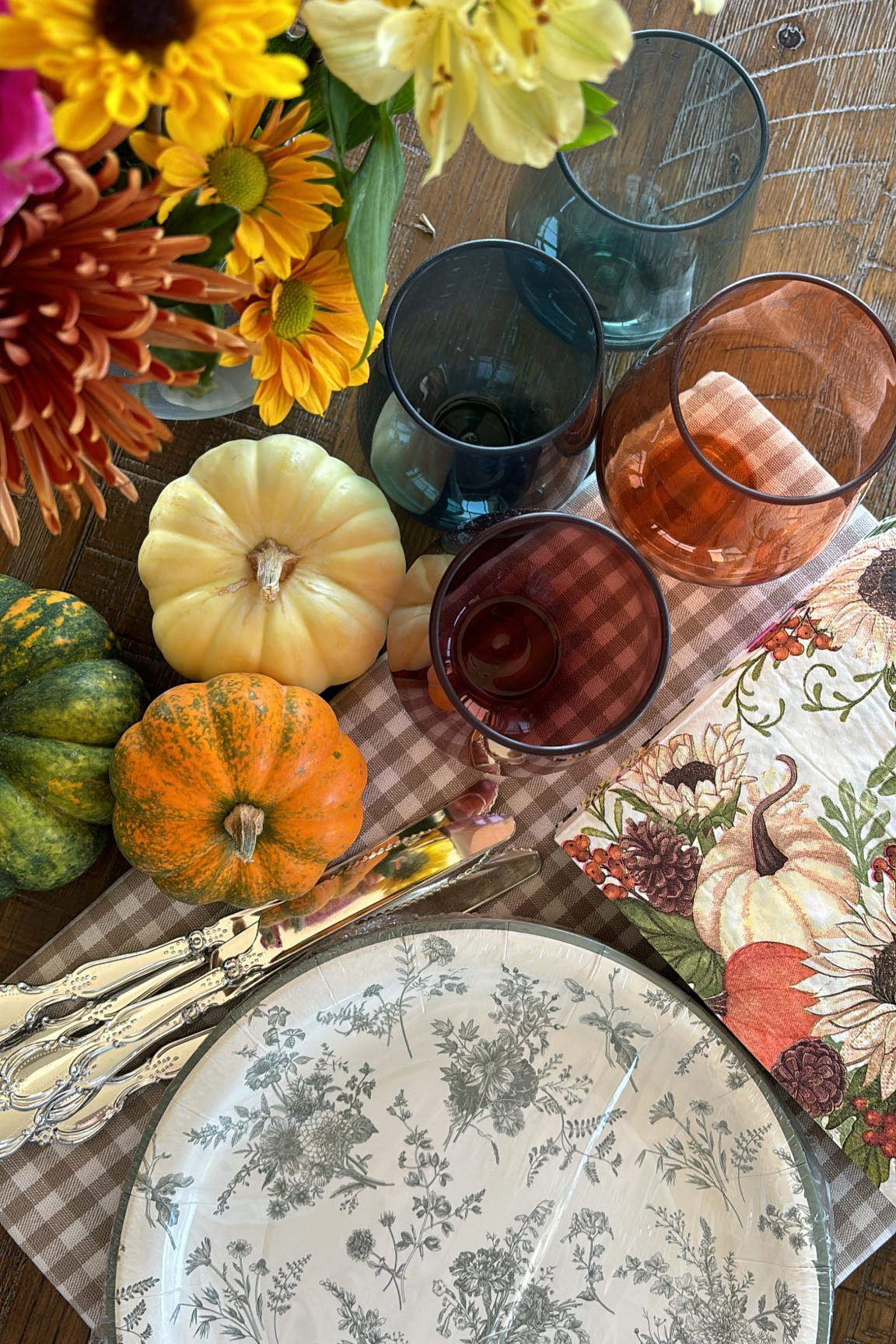 Fall hosting decor! No shame in my paper plate, budget decor game 🤎 I definitely prefer to use the good plates and silver, but it’s much easier in this stage of life with little ones to go the disposable, no dishes route. I still want my hosting decor to be fun and a little “dressed up,” so I find seasonal disposable items that are festive and eye-appealing! 

I got these acrylic, BPA-free stemless wine glasses because I’ve just been too nervous about our glasses breaking when hosting and having the littles running around! These colors are cute for fall 🍂

#fallhosting #falldecor #falltable #fallstyle #fallhome 

#LTKHome #LTKSeasonal #LTKFindsUnder50