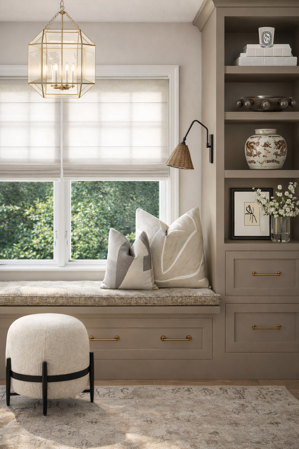 This is one of those spaces that quietly does everything right.

The tone-on-tone palette, the tailored Roman shade, the mix of soft textures against warm brass… it’s what makes a simple window seat feel elevated instead of expected. Nothing is loud, but every detail is intentional—and that’s exactly why it works.

If your space feels off, it’s usually not what you have—it’s how it’s layered. This is your reminder to mix materials (woven, wood, metal), keep your palette tight, and let contrast come through texture instead of color.

Everything here is the kind of piece you’ll keep forever—classic, versatile, and easy to build around. 

 #LTKHome