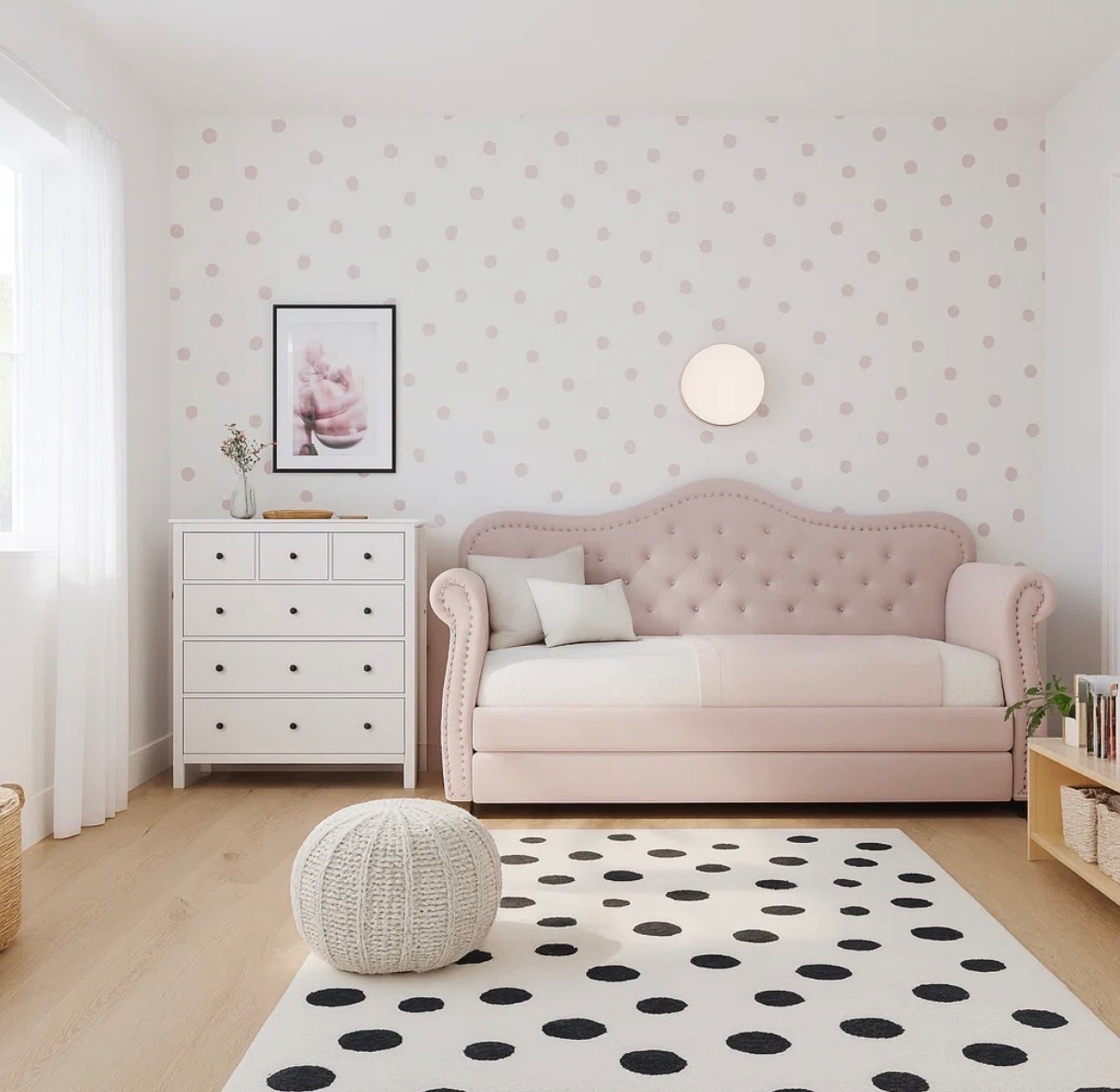 Pretty in pink and perfectly timeless 💕 This blush tufted daybed turns any nursery or toddler room into a dreamy, elegant retreat. Paired with soft polka-dot wallpaper, crisp white furniture, and cozy textures, this space feels both playful and sophisticated. ✨🧸

#LTKBaby #LTKHome #LTKSaleAlert