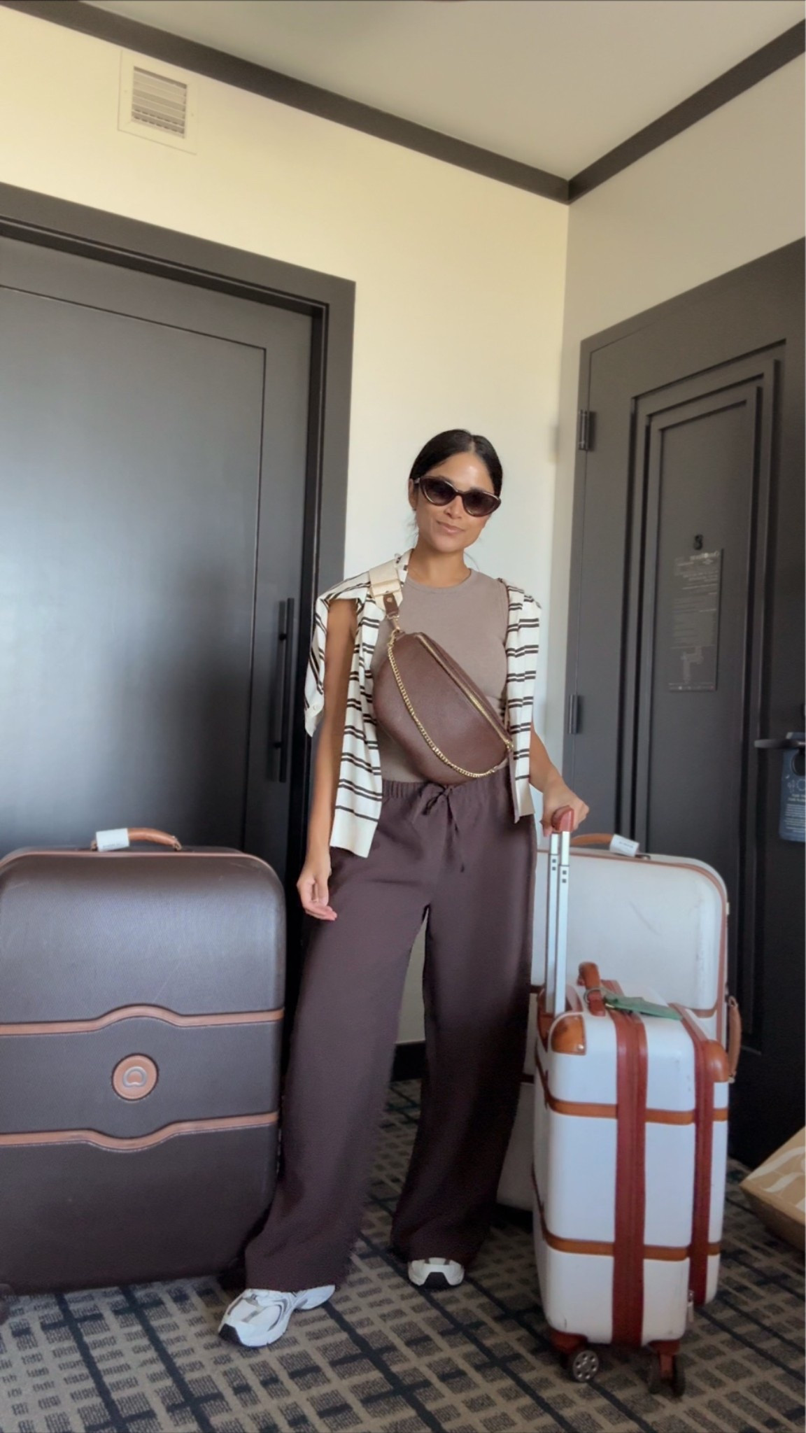 Airport travel outfit in my wrinkle resistant pants from @Aritzia! Take 20% OFF my Beck sling bag with code: HAUTE20
#travelstyle #giginewyork

#LTKootd #LTKTravel