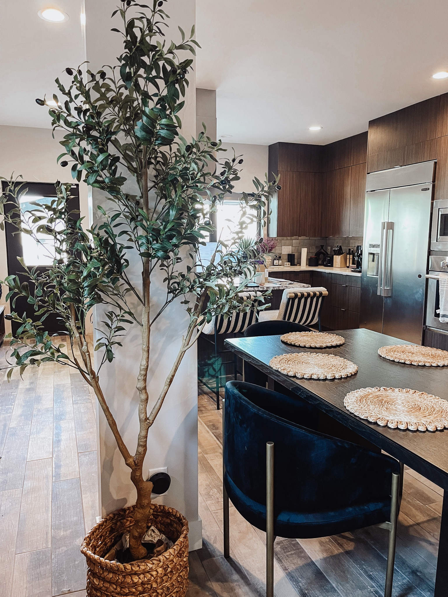 My favorite olive leaf tree is on sale for prime day! It’s tall (6 & 7’ options), so full and the wood looks so real .. hands down best olive tree I’ve found!

#LTKxPrimeDay #LTKFindsUnder100 #LTKHome