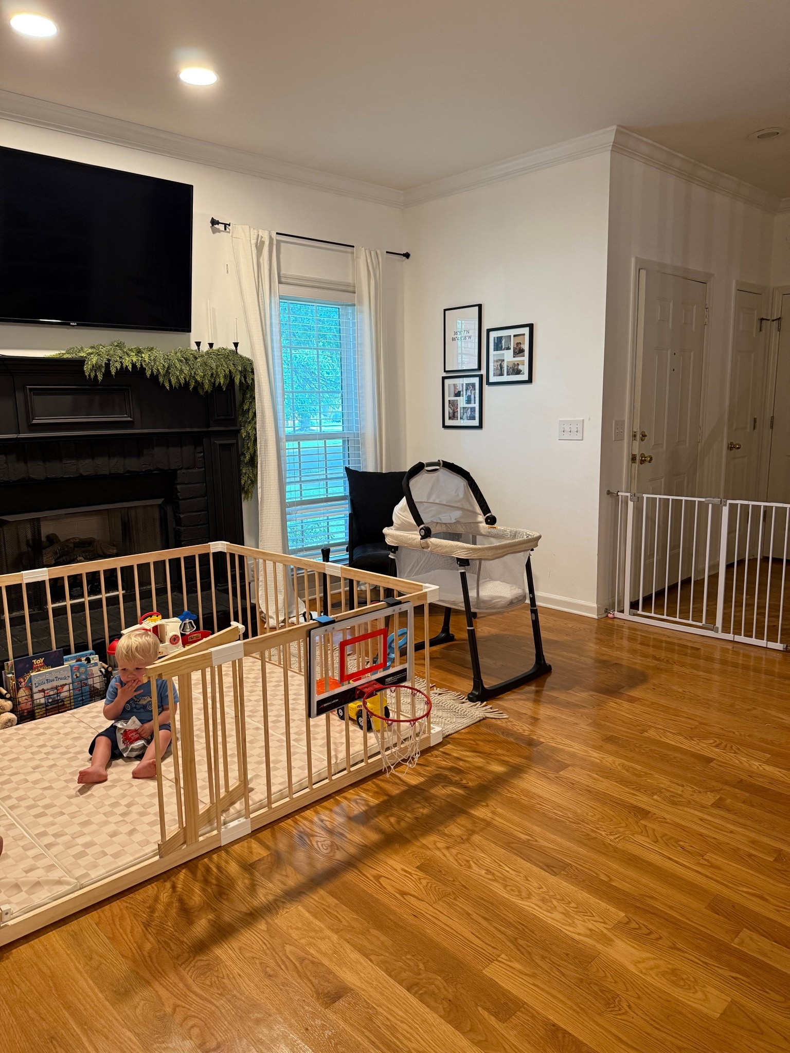 Our living room situation for 2 under 2: baby gates and portable bassinet 

#LTKKids #LTKBaby #LTKFamily