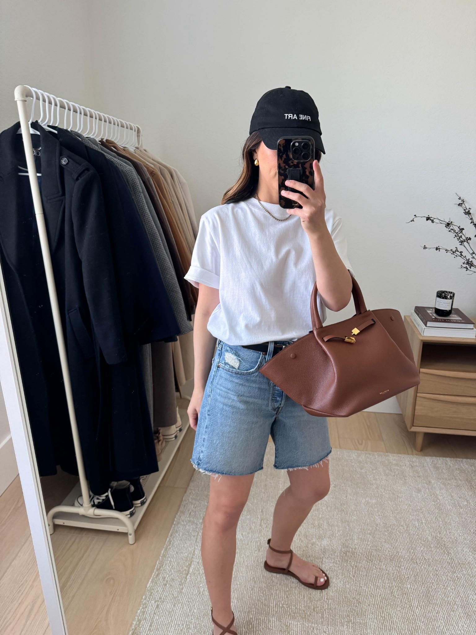 Spring outfits. 

How to style long denim shorts. Long denim shorts on petites. These are a great option even for petites. 

J.Crew tee small (old, linked similar)
Levi's mid denim shorts 26, I sized up
Tkee sandals 5
DeMellier bag mid
Fine Art hat (old, linked similar)
Dorsey James necklace 16"
Madewell earrings (old)
Calvin Klein belt (old)

Spring outfits 2026, petite style, spring style, denim shorts 

#LTKootd #LTKmomlife #LTKPetite