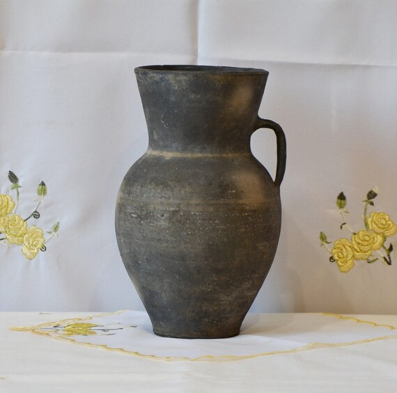 Read the full title
    Antique primitive clay vessel. Old black ceramic pot. Wabi sabi pottery v... | Etsy (UK)