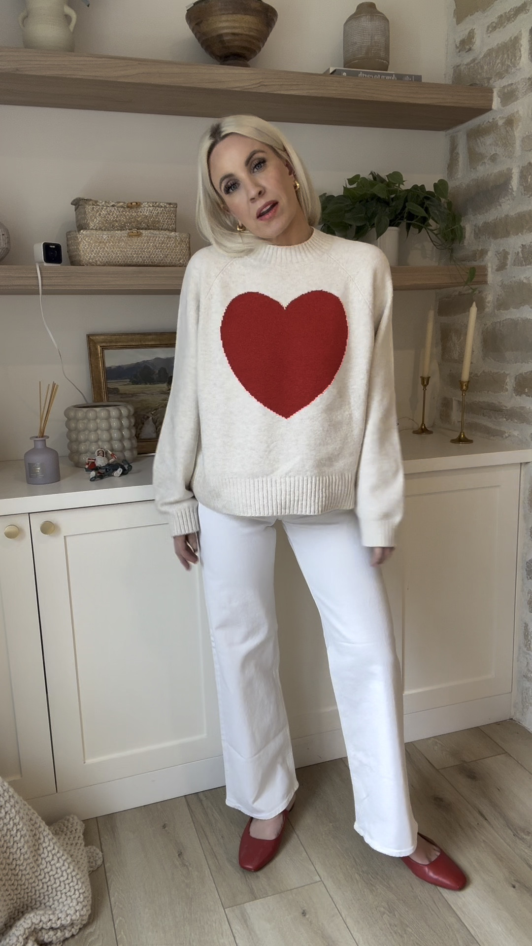 How cute is this heart sweater?! Wearing a size medium! These white pants are from H&M, wearing a size 4! 

#LTKFindsUnder100 #LTKStyleTip #LTKFindsUnder50
