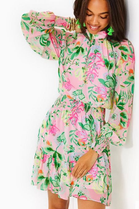 Lilly Pulitzer Ellielynn Long Sleeve Dress. Embrace effortless elegance in the Ellielynn Long Sleeve Dress. Its easy fit features a smocked waist and cuffs for comfort, a playful ruffle at the hem, and a functional tie-back neckline.

#LTKparties #LTKSeasonal #LTKstyletip