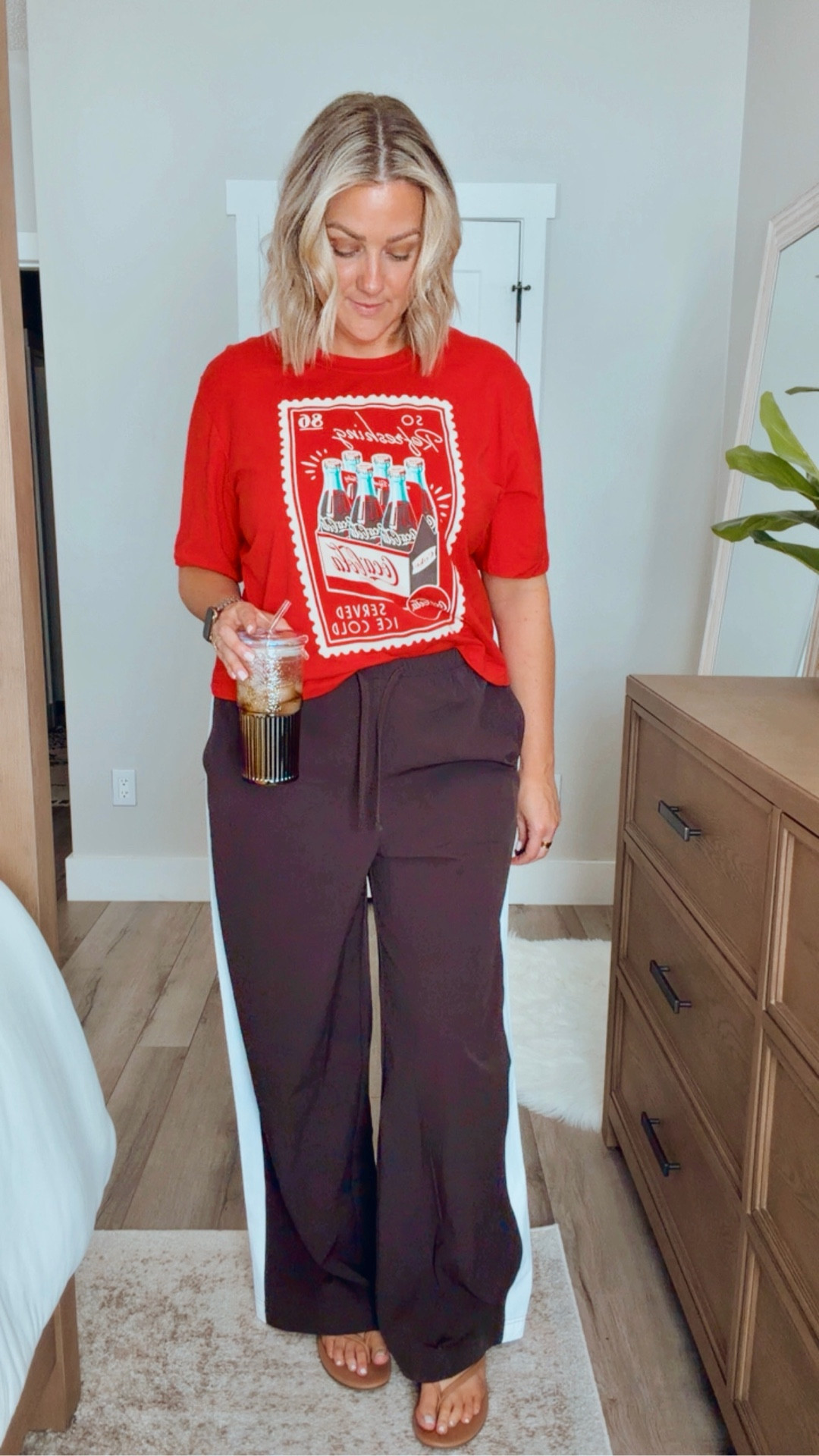 Easy, comfy, and just the right amount of bold ❤️
This graphic tee + flowy pant combo is one of those throw-on-and-go looks that still feels put together.

Sized up to an XL in the tee for that relaxed fit
Wearing L Tall in the pants (could’ve done a M Tall for a more fitted waist)

#LTKmomlife #LTKMidsize #LTKOver40