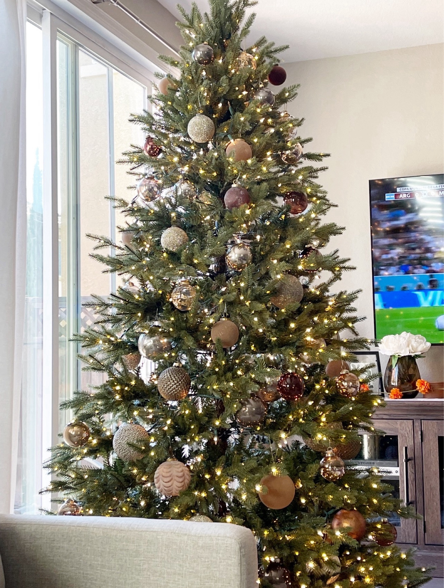 Christmas Tree | Christmas decor | neutral Christmas decor | warm brown and gold Christmas decor | tree ornaments | faux fur Christmas tree skirt; Leanne ford crate & barrel textured ornaments; tinsel ball Christmas ornament gold; champagne and chocolate glass ornaments; espresso glass ornaments set; matte espresso glass ornaments set; McGee and co christmas; studio McGee Christmas; metallic marbled ornament McGee and coSaleSale

#LTKSeasonal #LTKHoliday #LTKHolidaySale