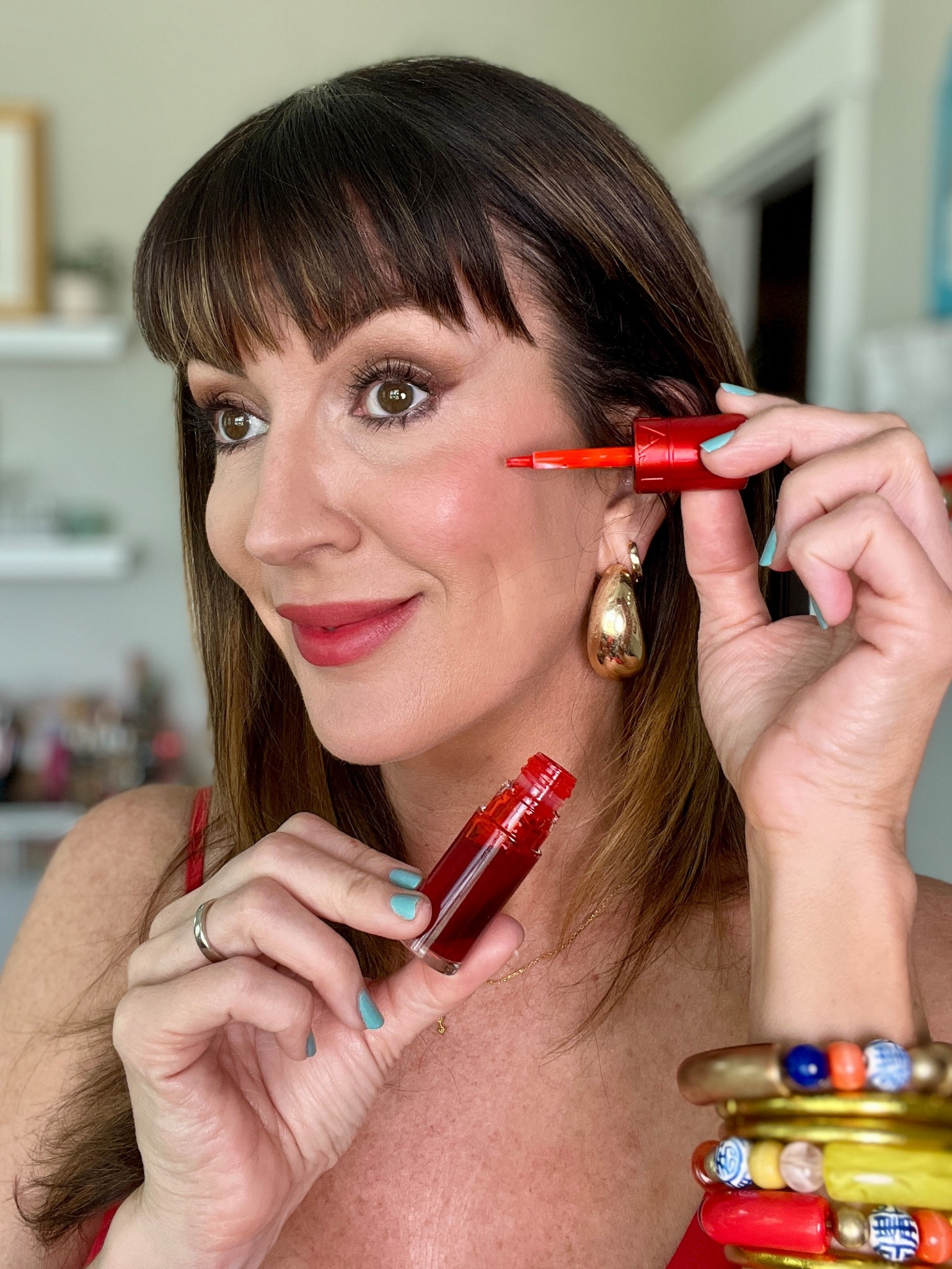 ❤️🩷💜 The newest Clarins hydrating matte water LIP stain that also acts as a gorgeous matching CHEEK stain!! // wearing shade “red water” here // using a cream blush brush is a MUST tho or it could look streaky! 

#LTKFindsUnder50 #LTKOver40 #LTKBeauty