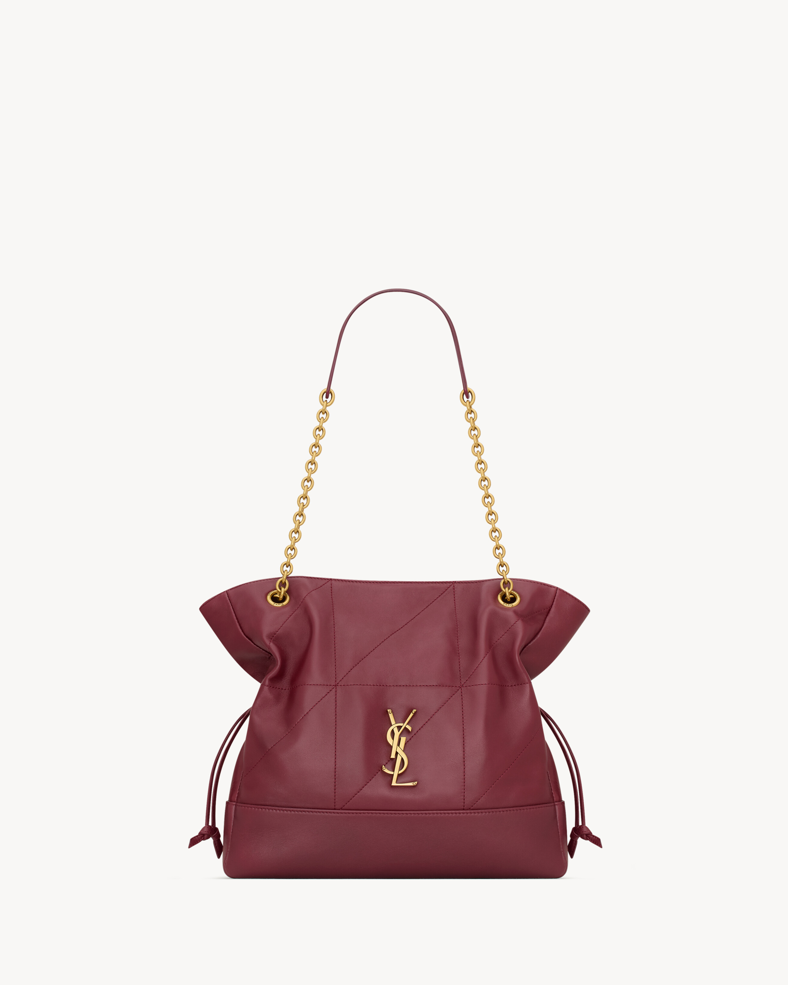 The small tote version of the JAMIE in supple nappa, decorated with the CASSANDRE and CARRÉ RIVE... | Saint Laurent Inc. (Global)