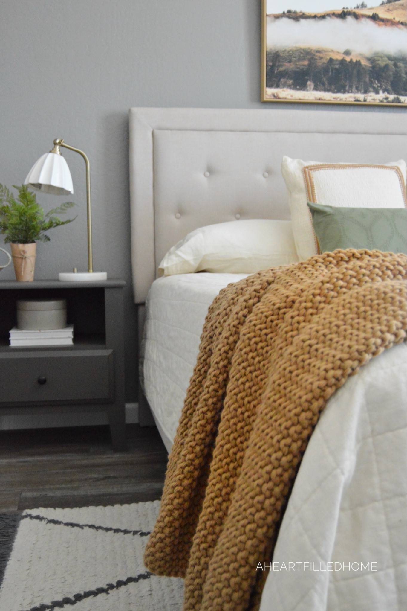 Bedroom makeover with upholstered bed, area rug, lamp, artwork, and more! 

#LTKHome #LTKFindsUnder100 #LTKFindsUnder50