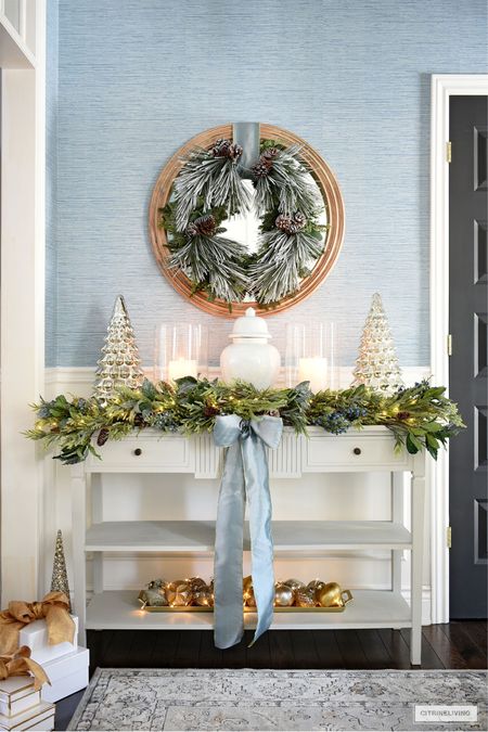 Deck your entryway in gorgeous greenery, mercury glass Christmas tree, candles and ginger jars

#LTKstyletip #LTKHoliday #LTKhome