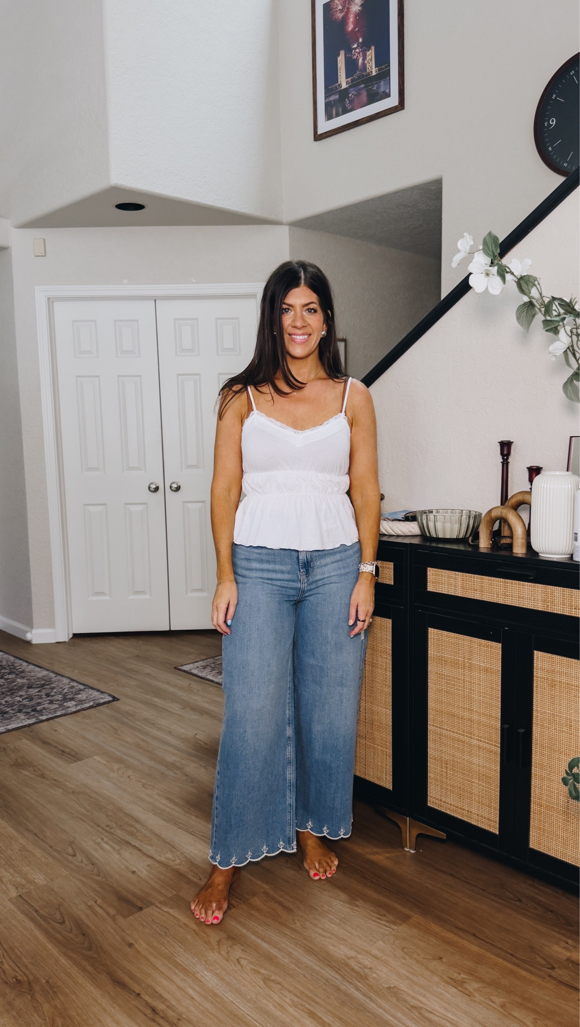 In a small tank (size down if in between) and an 8 jeans

#LTKMidsize #LTKTall #LTKSaleAlert