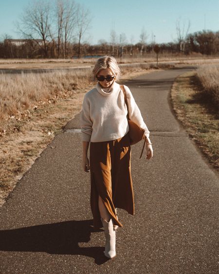 Thanksgiving outfit idea - rust colored skirt with a cropped turtleneck sweater and taupe cowboy boots 

#LTKHoliday #LTKSeasonal