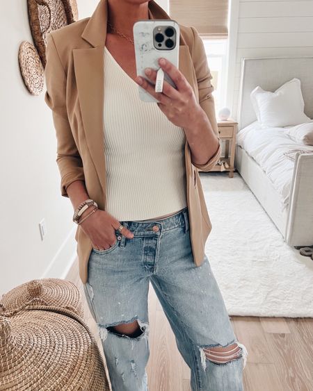 I sized down in length to a 2 regular for these boyfriend jeans. Wearing small in the tank and XS in the blazer.

#LTKworkwear #LTKsalealert #LTKstyletip