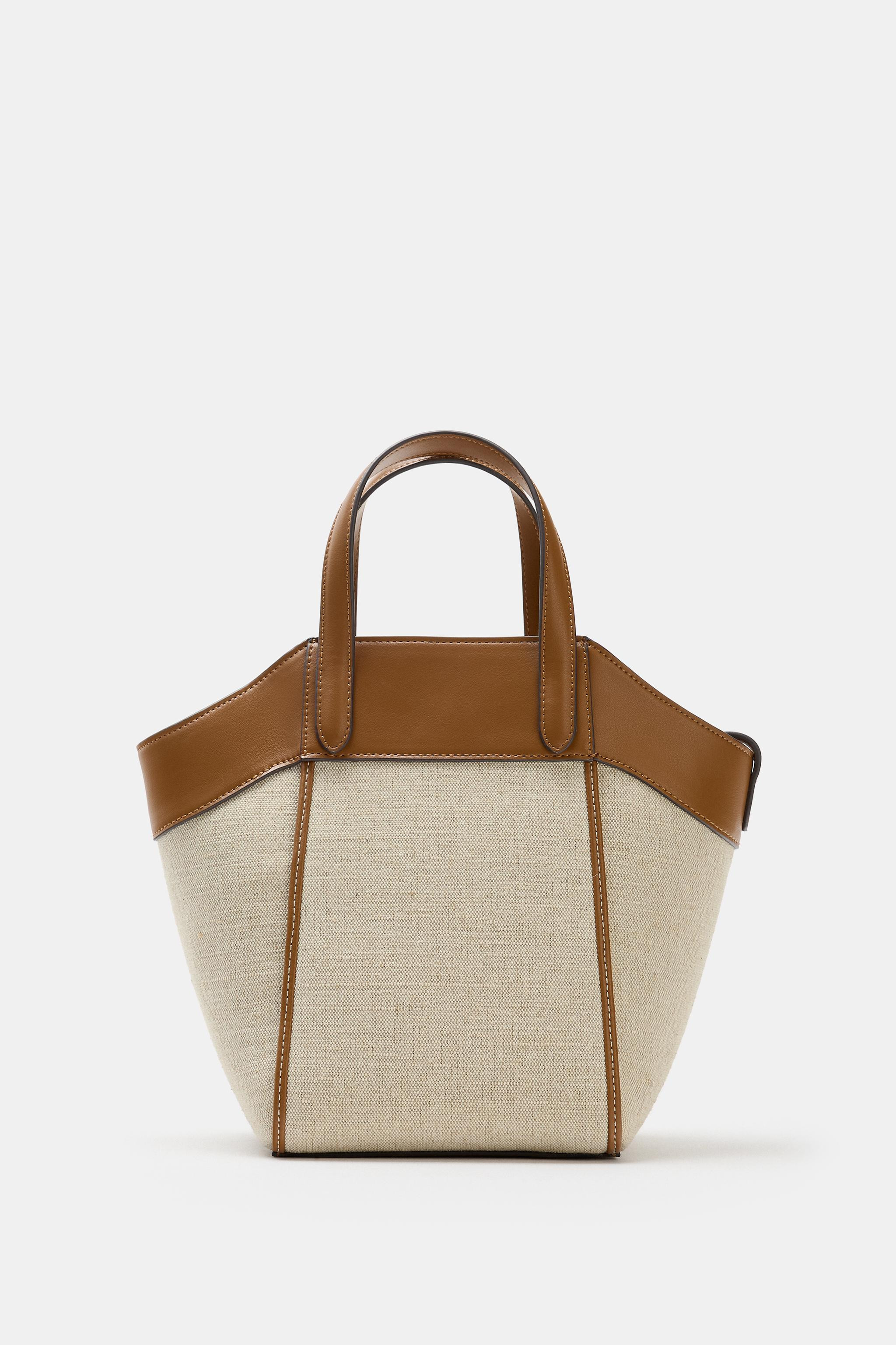 Canvas crossbody bag. Exterior with mixed material details. Interior pocket with zip closure. Dou... | Zara US