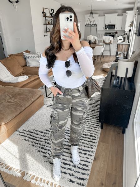 Spring Transition Look 🖤🤍

Top — small but wish I sized down one!
Pants — 27 

casual spring outfits | spring style | casual outfits | casual fashion | style inspo | camo cargo pants | white off the shoulder top outfit | white leather platform converse sneakers outfit | spring brunch outfit ideas | spring running errands outfit | high top converse sneakers | camo pants | cargo pants style | cargo pants outfit ideas 

#LTKfindsunder100 #LTKfindsunder50 #LTKstyletip