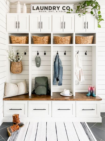 Mudroom laundry room styling and home decor lockers cubbies organization baskets floral stems cherry blossoms pillows and pillow covers ll bean boots ruggable washable rugs area rugs diaper bag backpack lululemon storage and organizing 

#LTKfindsunder50 #LTKstyletip #LTKhome