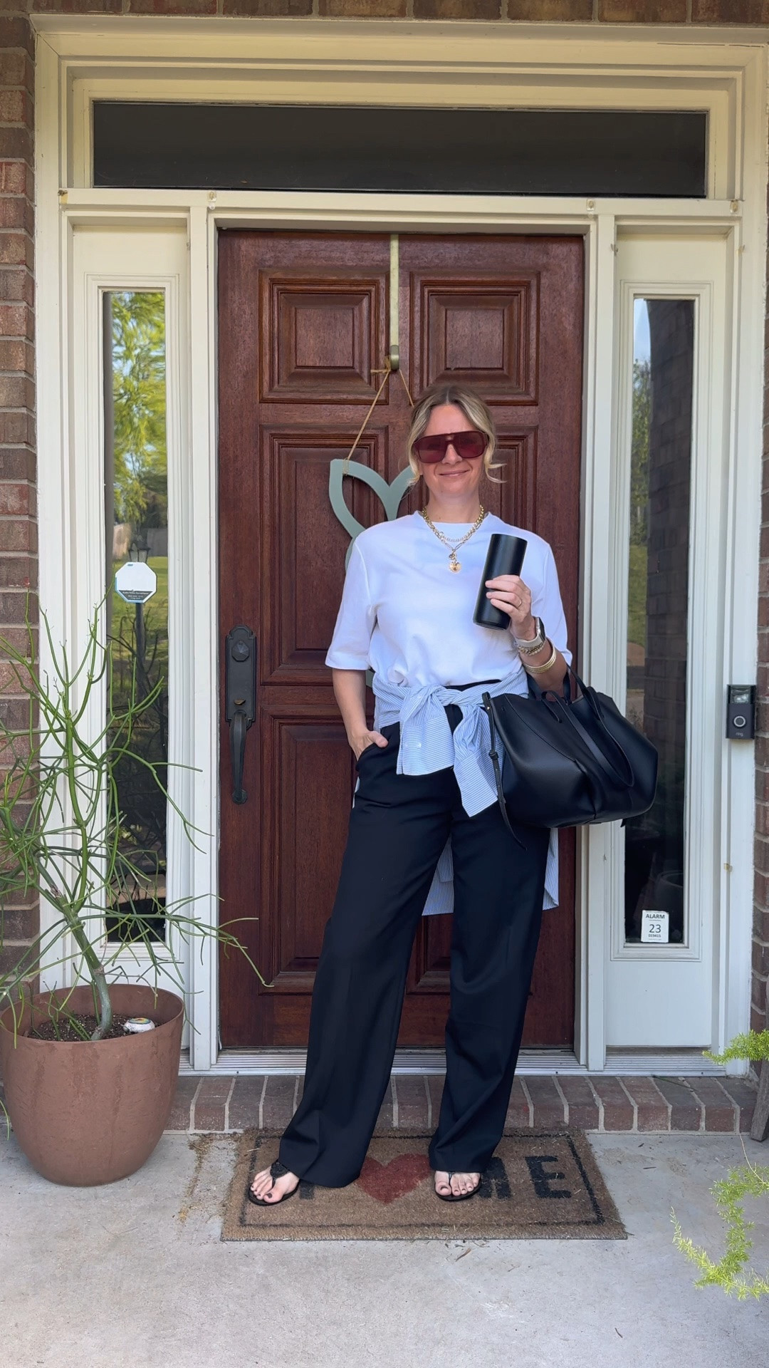 OOTD for an easy weekend ✨ Oversized white tee + black trousers + a shirt tied at the waist + black jelly flip flops. All from my own closet — linked the closest versions I could find. Everything shoppable below! 👇

#LTKdayinmylife #LTKootd #LTKOver40
