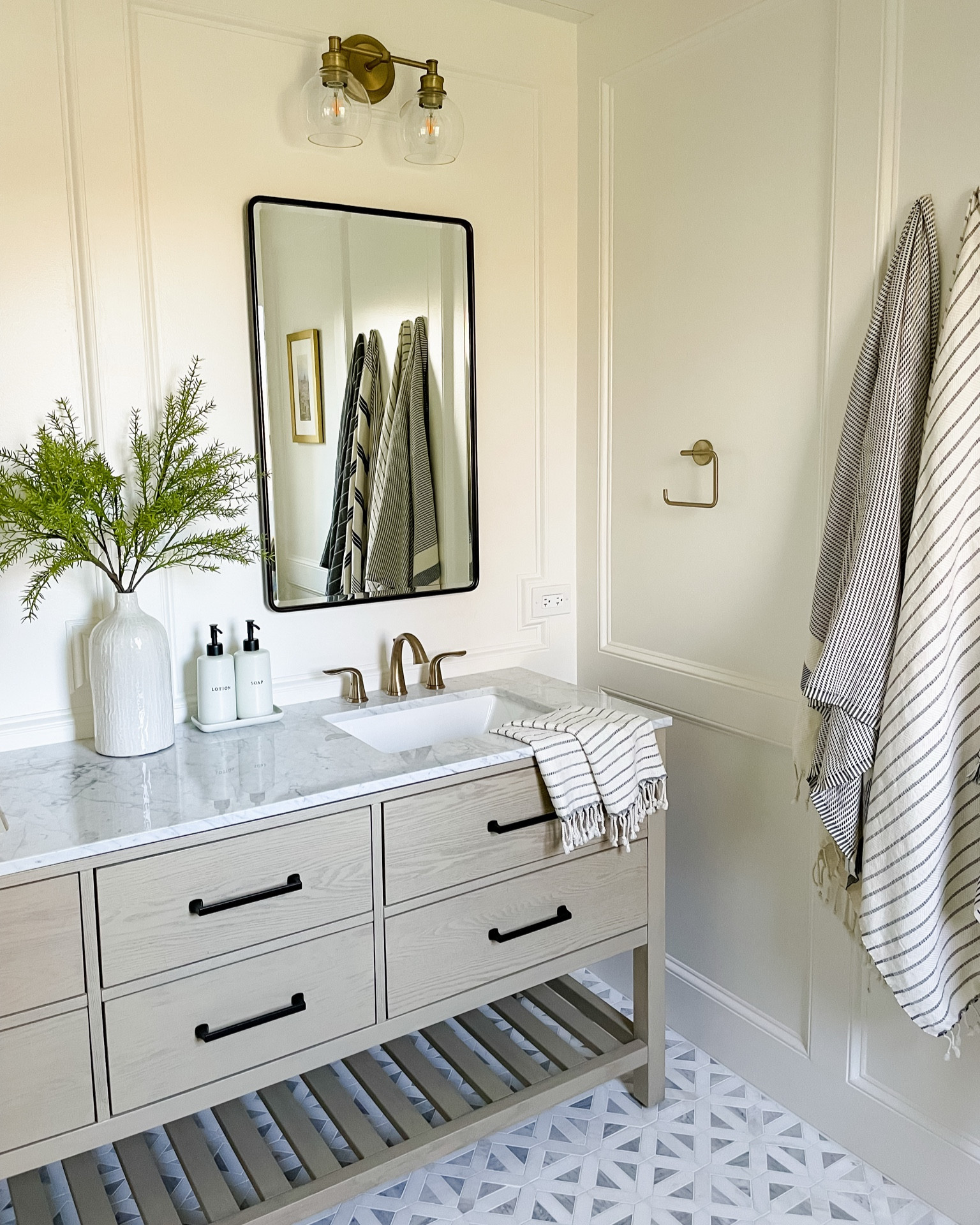 It’s been a little over 3 years since we’ve finished our bathroom renovation. I still love everything about it! 

Bathroom design. Home decor. Recessed medicine cabinet. Bathroom mirror. Bathroom faucet. Bathroom hardware. Double vanity. Soap dispenser. Marble tile. Turkish towels. Towel holder. Vanity light. Drawer pull. Cabinet hardware. Bathroom transformation. Before and after. Neutral decor. Transitional home design.