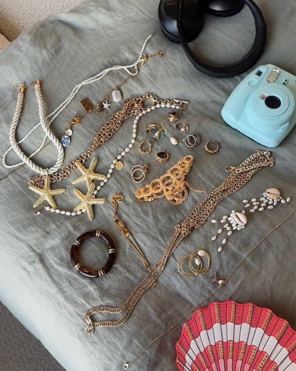 Packing for Hawaii 🌺

—

Gold jewelry for vacation with pearls and star fish designs. Gold girl. Gold chain jewelry. Bangle bracelets. Travel favorites. Polaroid camera and headphones for travel.

#LTKTravel #LTKSeasonal #LTKWedding