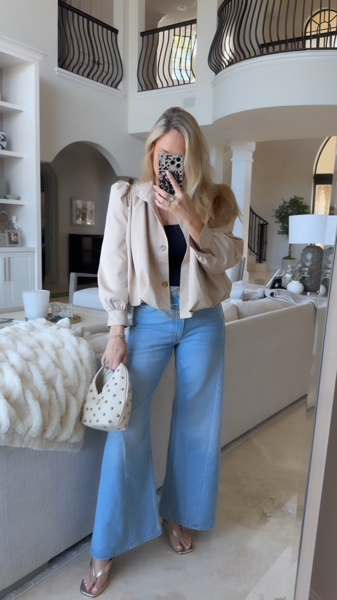 Date night outfit. ￼💕Love these lemon twist wide leg denim so flattering perfect for a kitten heel or flats. Wearing a size 27 fit treated size. 🎉This cute crop trenchcoat is from Amazon as well as my really comfy gold kitten heels brand new studded bag on sale.!🖤

#LTKOver40 #LTKdayinmylife #LTKootd